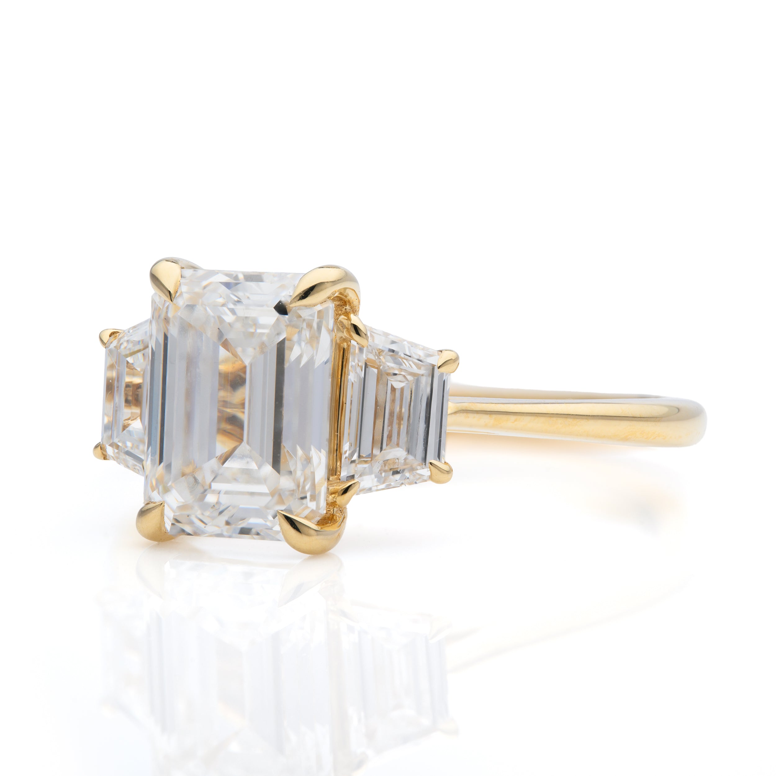 18ct Yellow Gold Emerald Cut Lab Grown Diamond and Trapezoid Cut Lab Grown Diamond Trilogy Ring