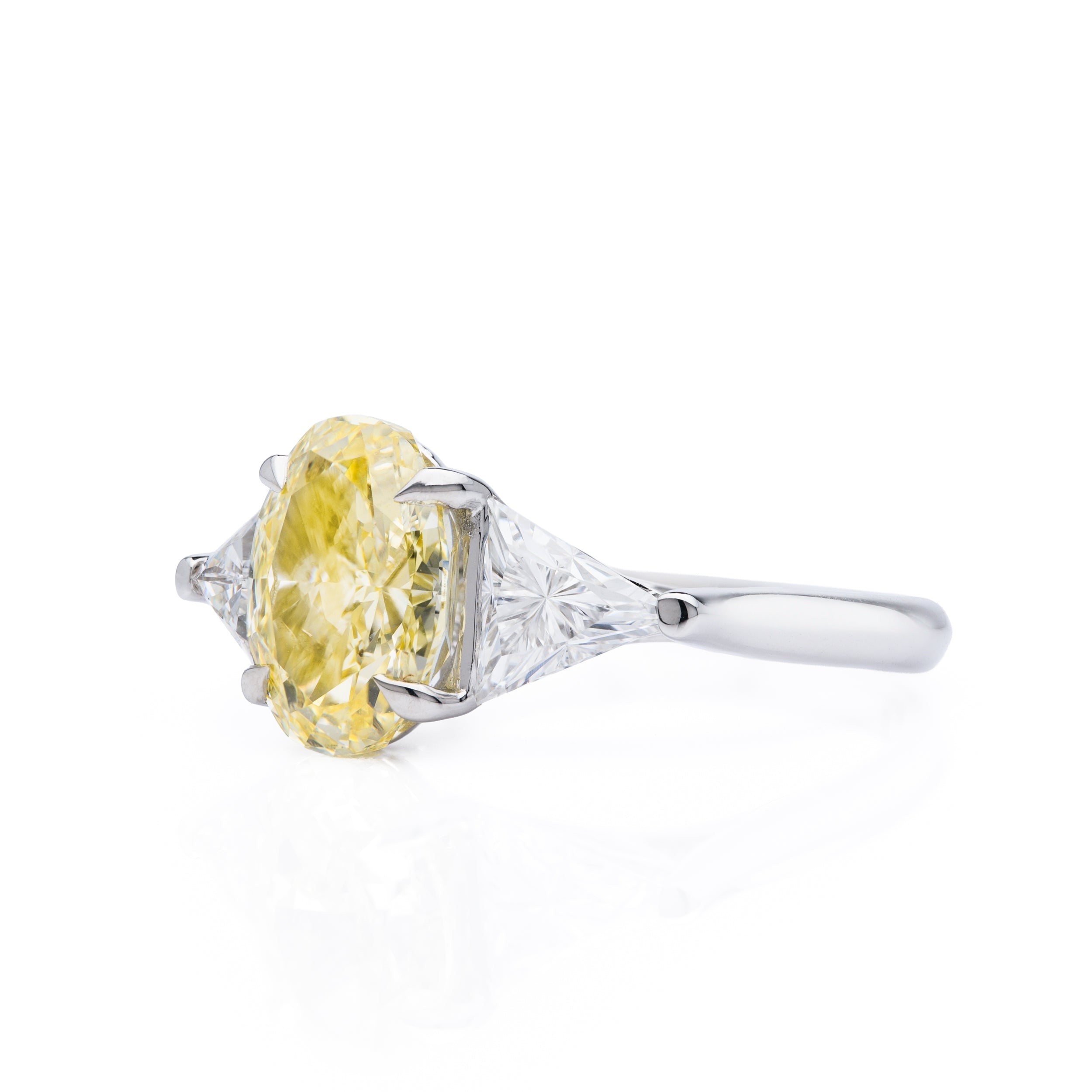 18ct White Gold Oval Cut Yellow Lab Grown Diamond and Trilliant Cut Lab Grown Diamond Shoulder Trilogy Ring