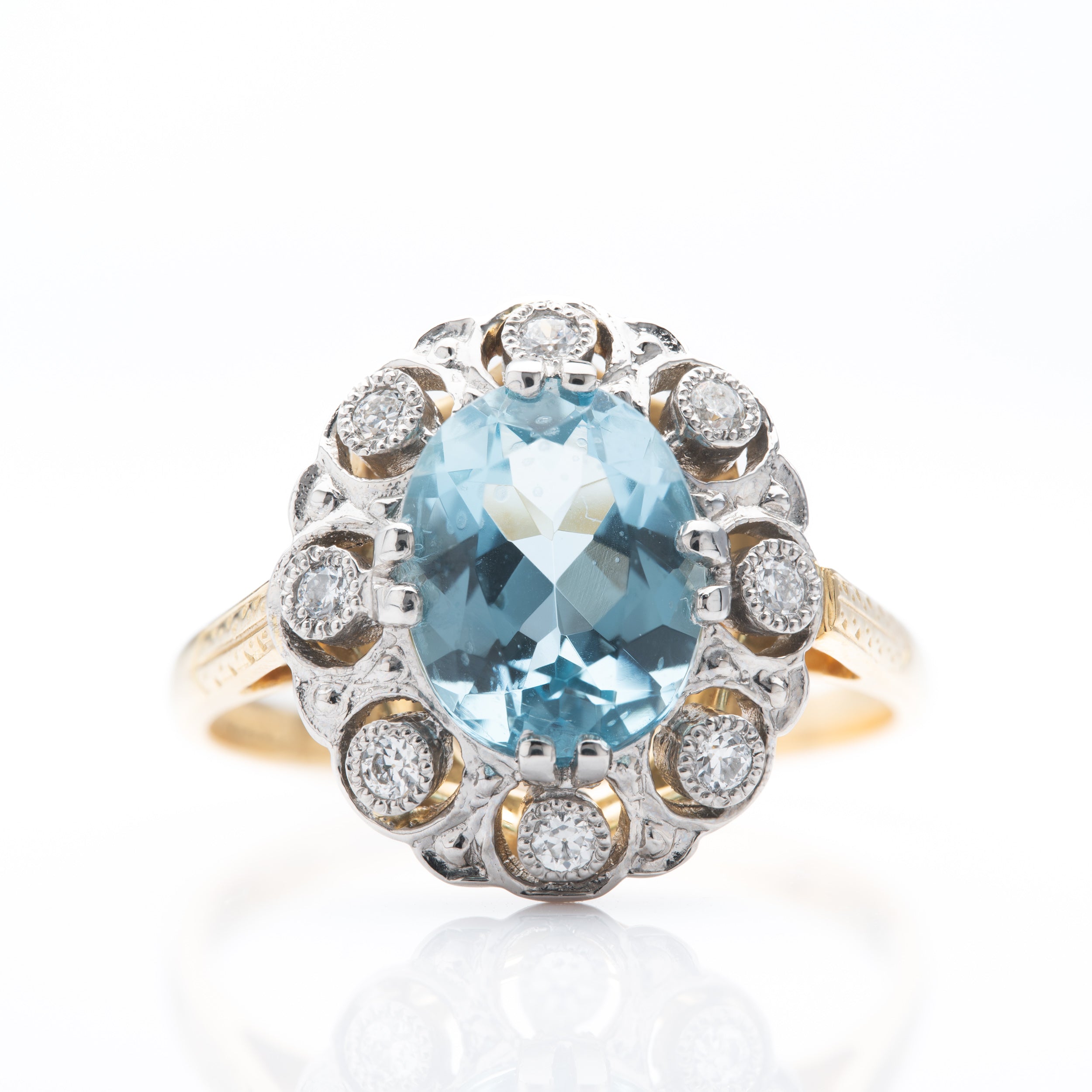 18ct Yellow Gold & Platinum Oval Cut Aquamarine & Round Brilliant Cut Diamond Cluster Ring