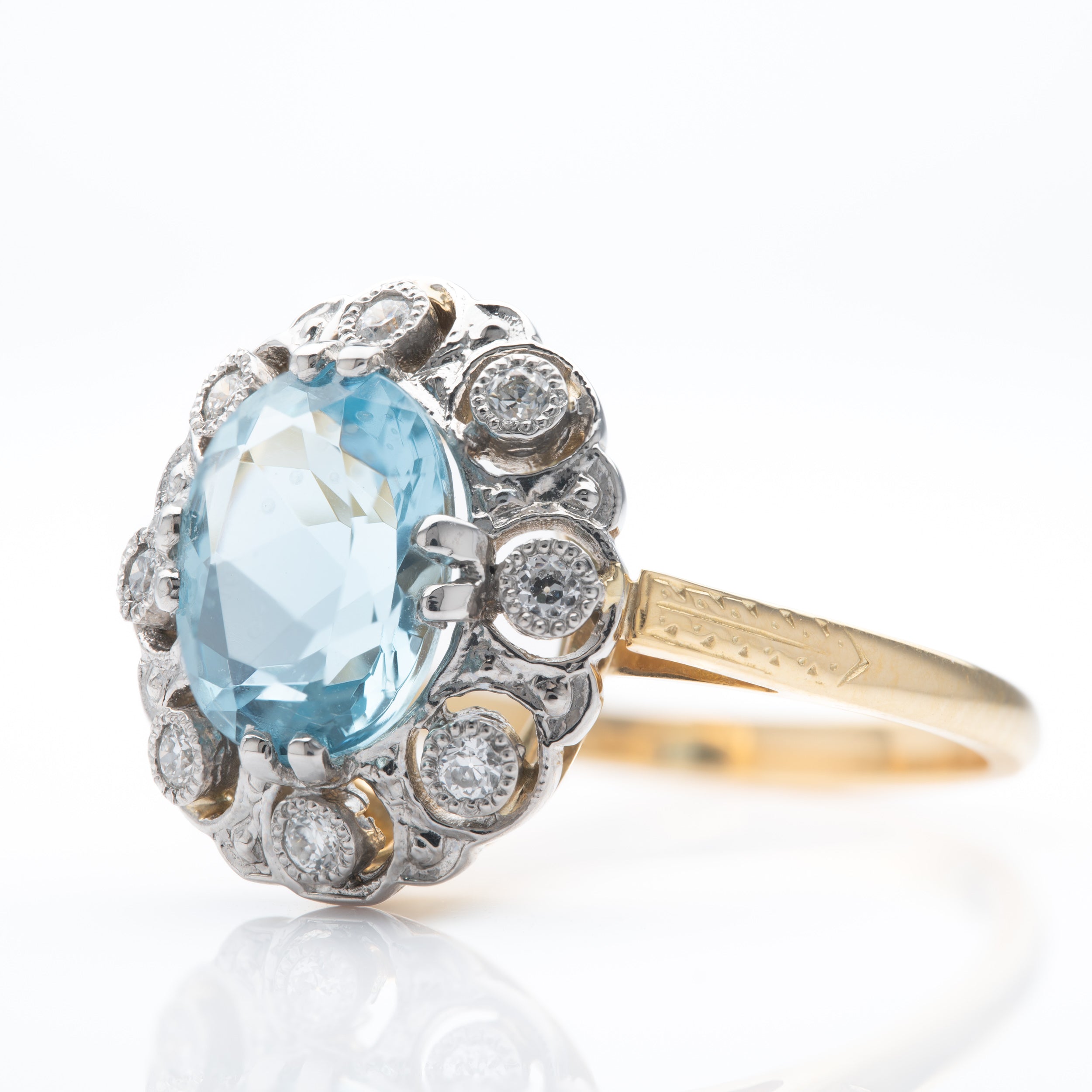 18ct Yellow Gold & Platinum Oval Cut Aquamarine & Round Brilliant Cut Diamond Cluster Ring