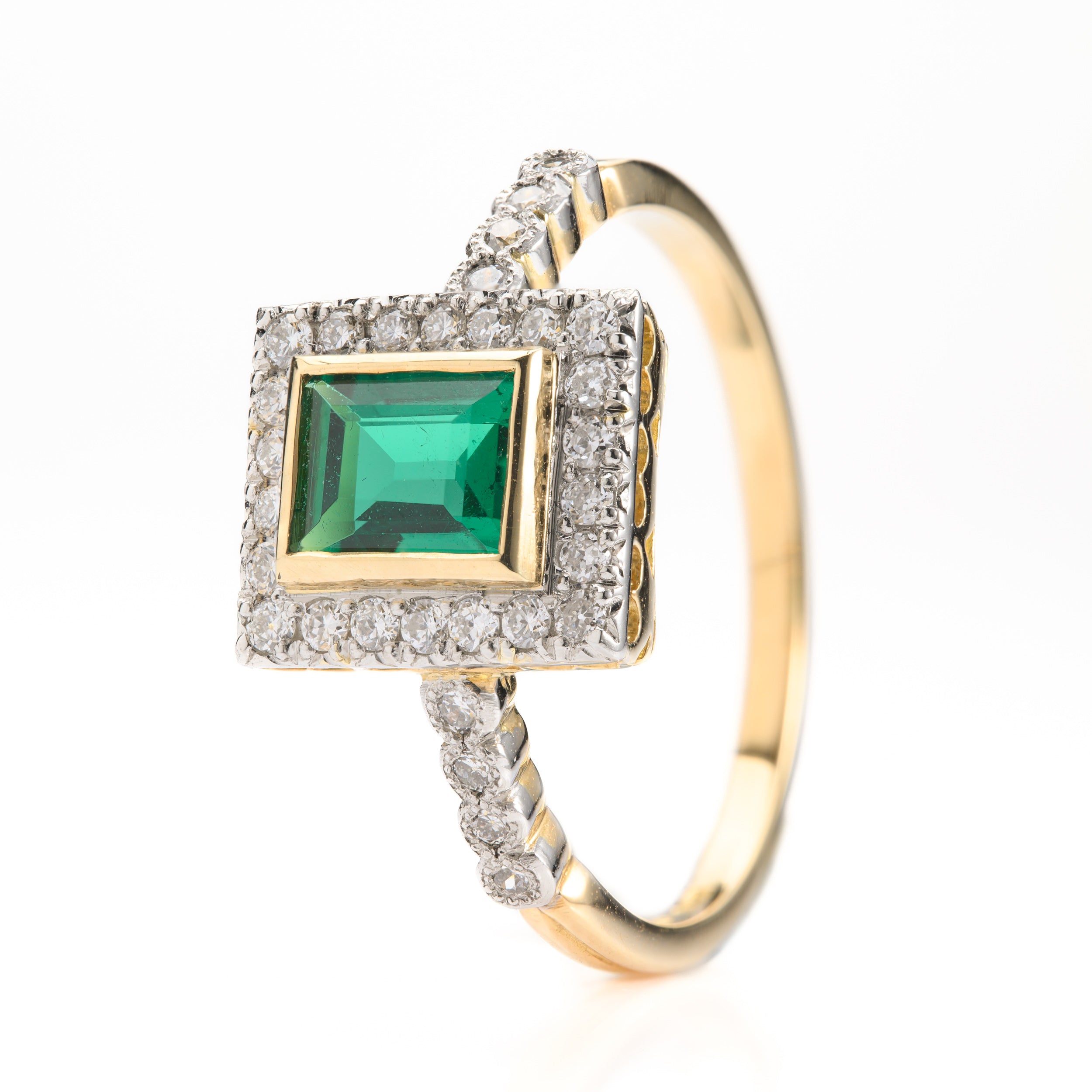 18ct Yellow Gold & Platinum Rectangular Cut Emerald & Round Brilliant Cut Diamond Halo Cluster Ring