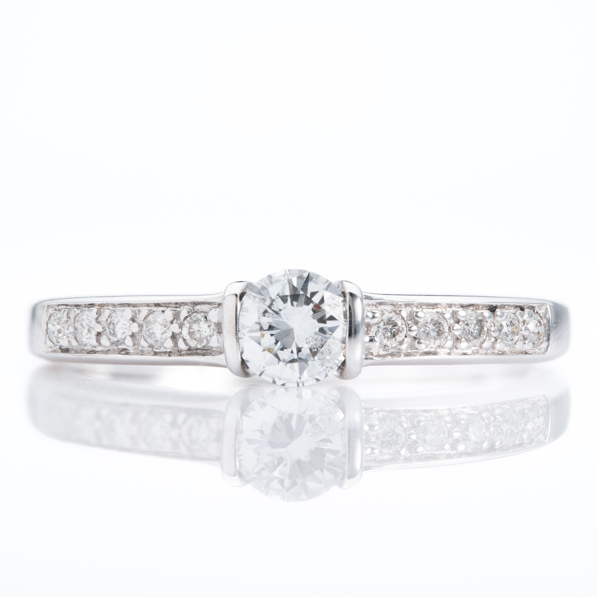 18ct White Gold Tension Set Round Brilliant Cut Diamond ring with Diamond Shoulders