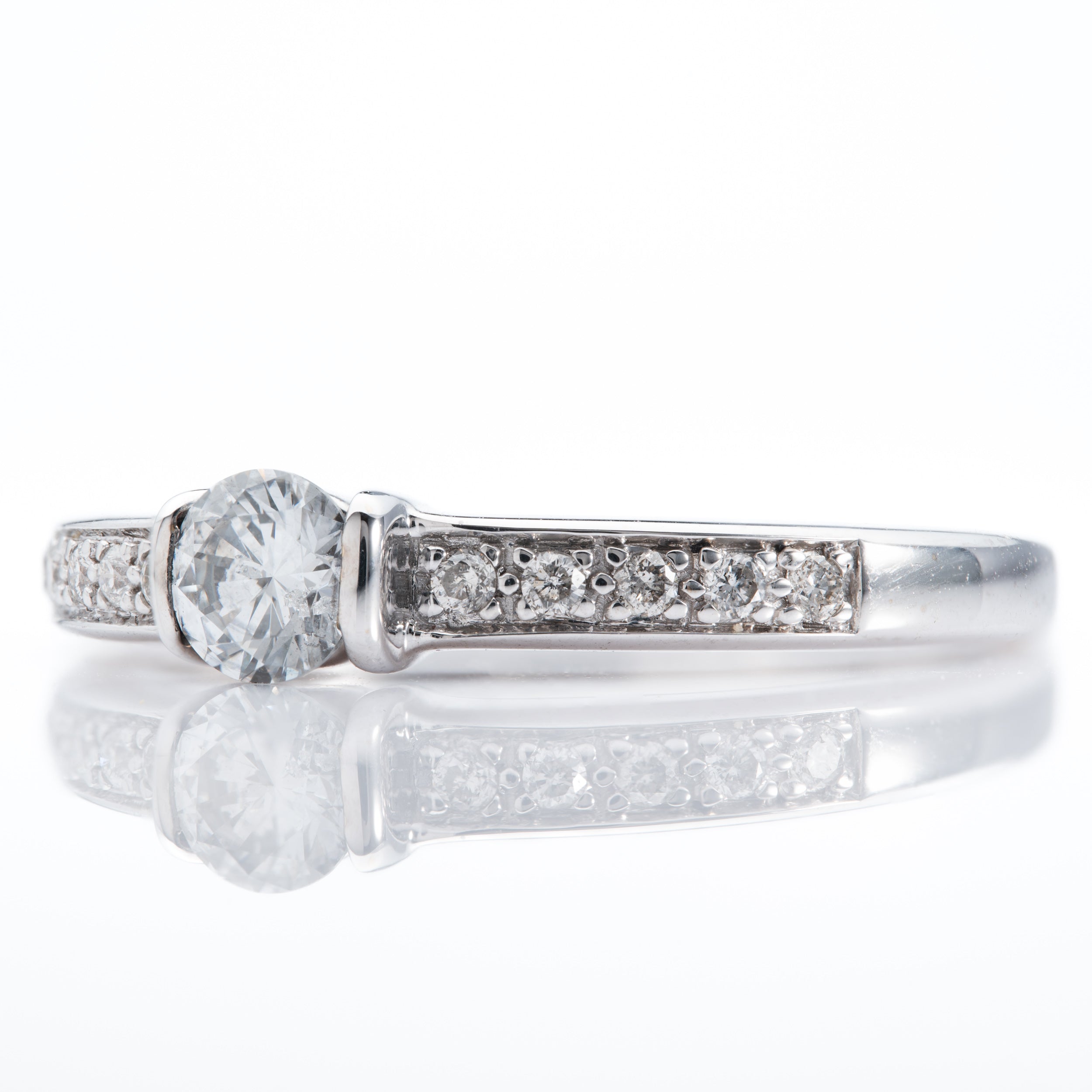 18ct White Gold Tension Set Round Brilliant Cut Diamond ring with Diamond Shoulders