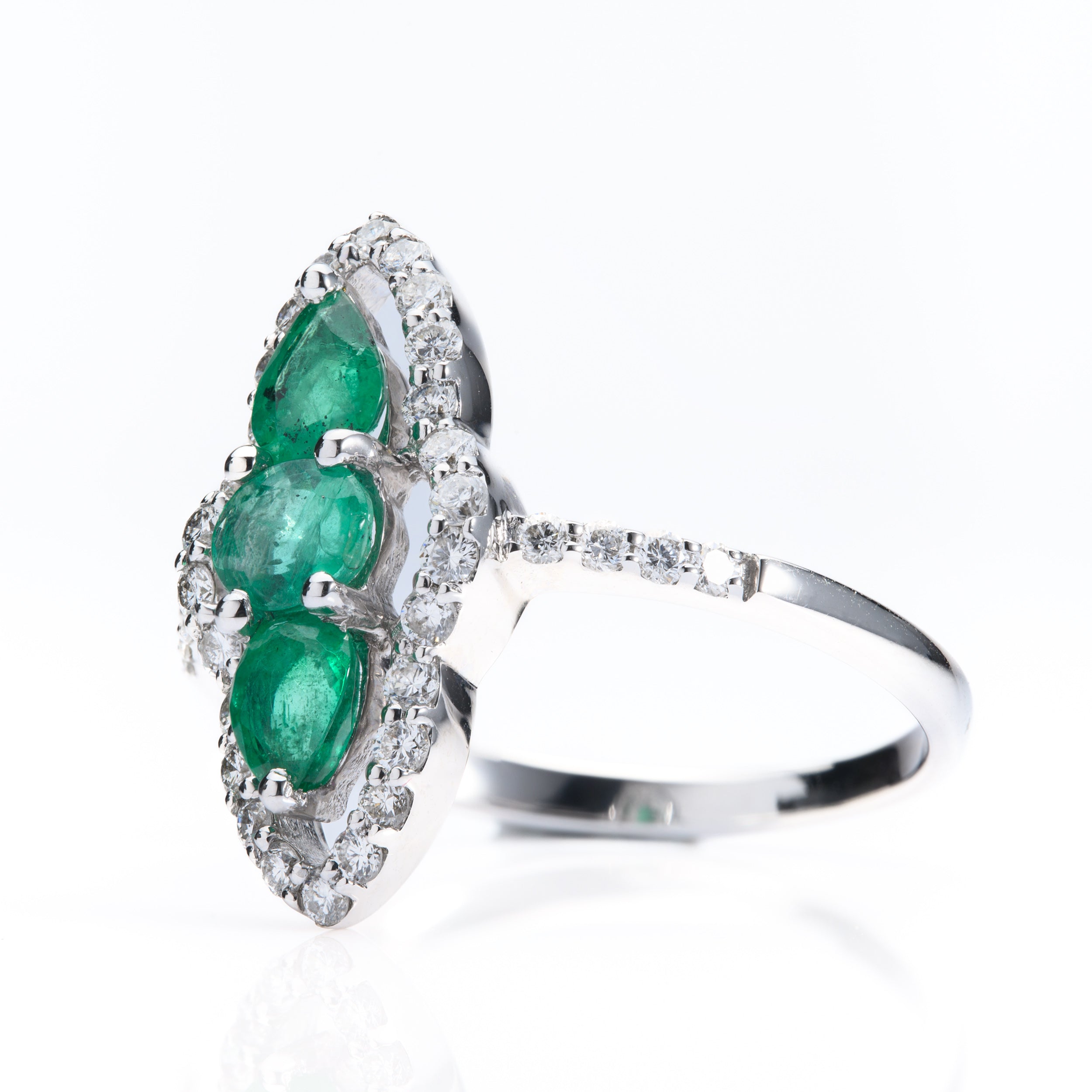 18ct White Gold Marquise Shaped Emerald & Diamond Triple Halo ring