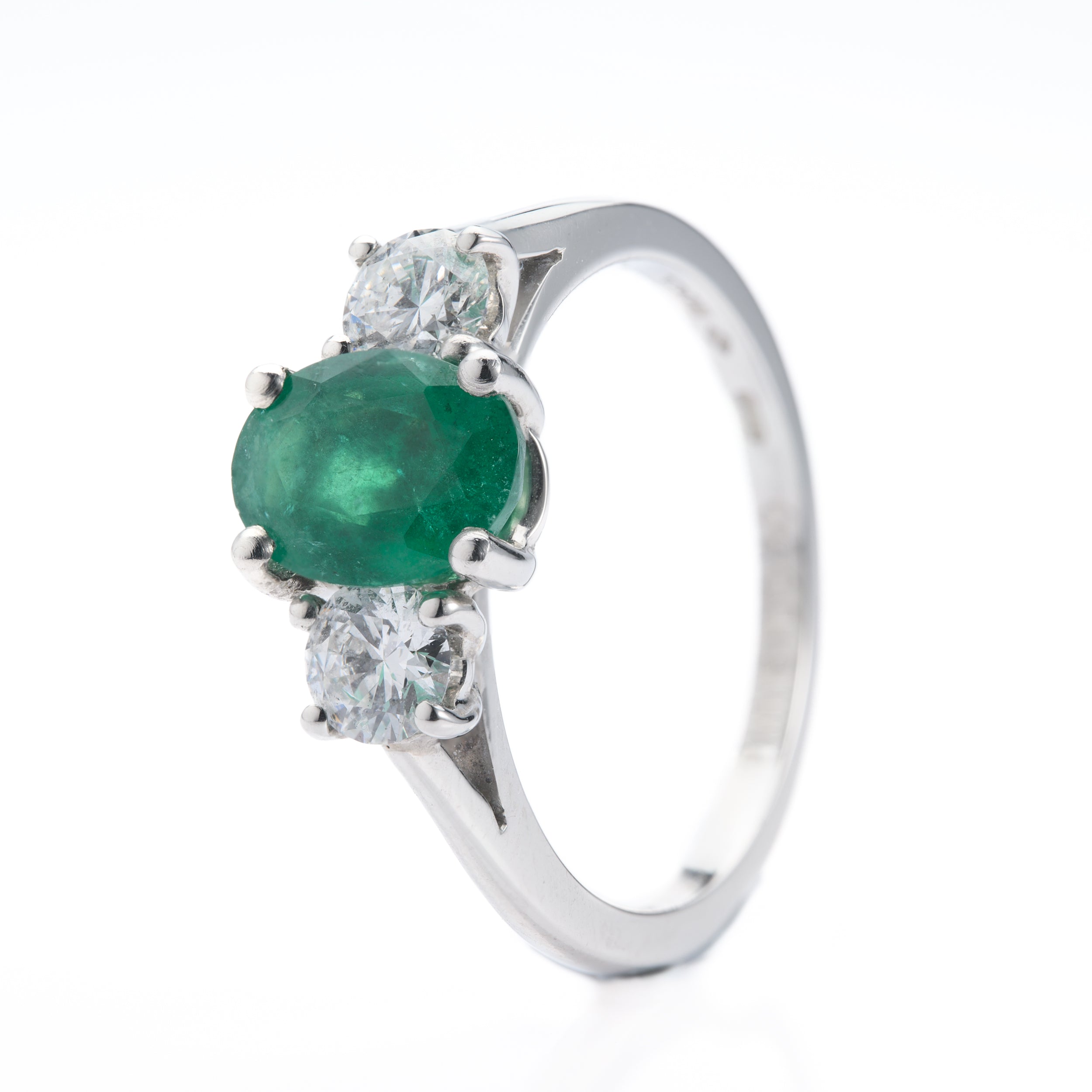 Platinum Oval Cut Emerald & Round Brilliant Cut Diamond Trilogy Ring