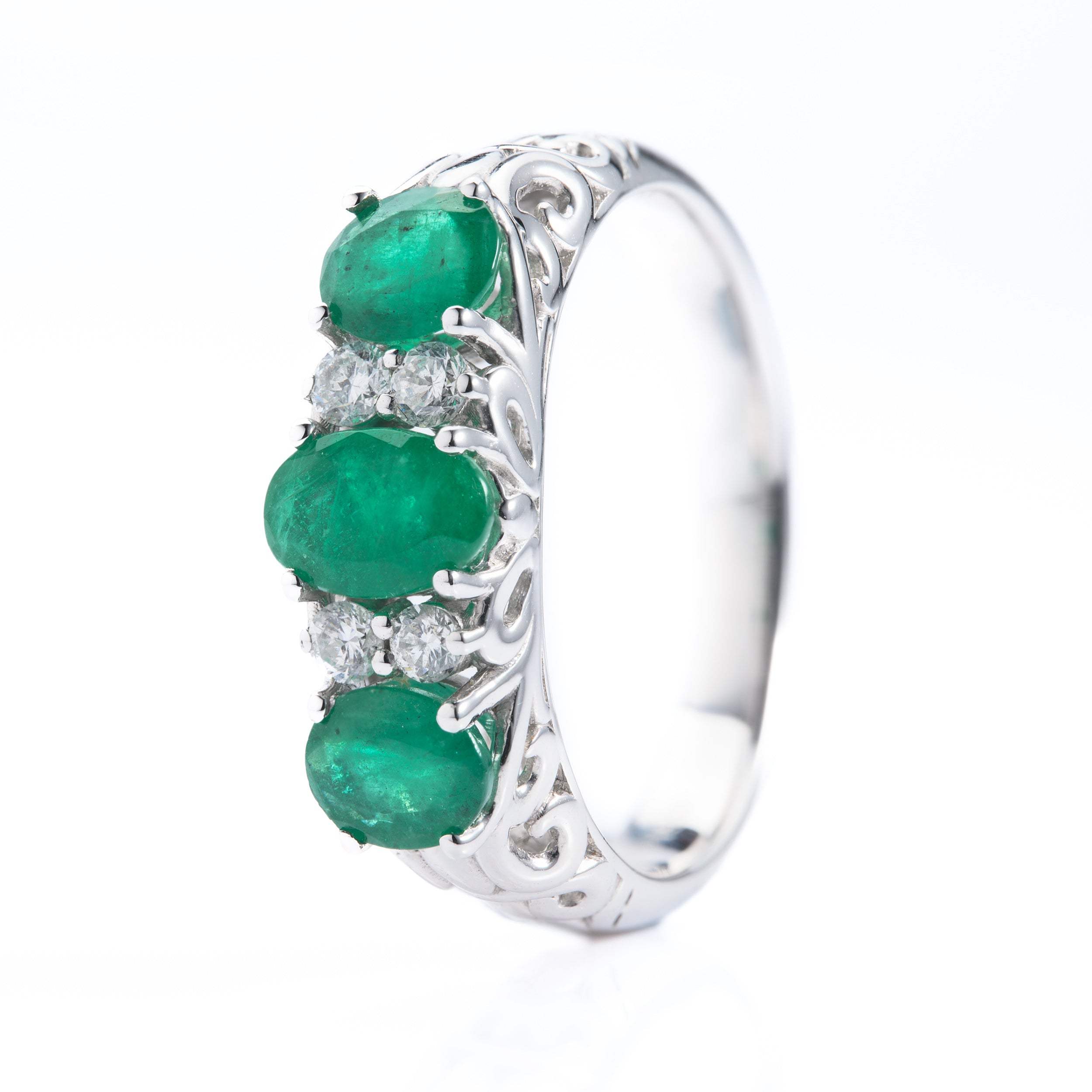 Platinum Oval Cut Emerald & Round Brilliant Cut Diamond 7-Stone Ring