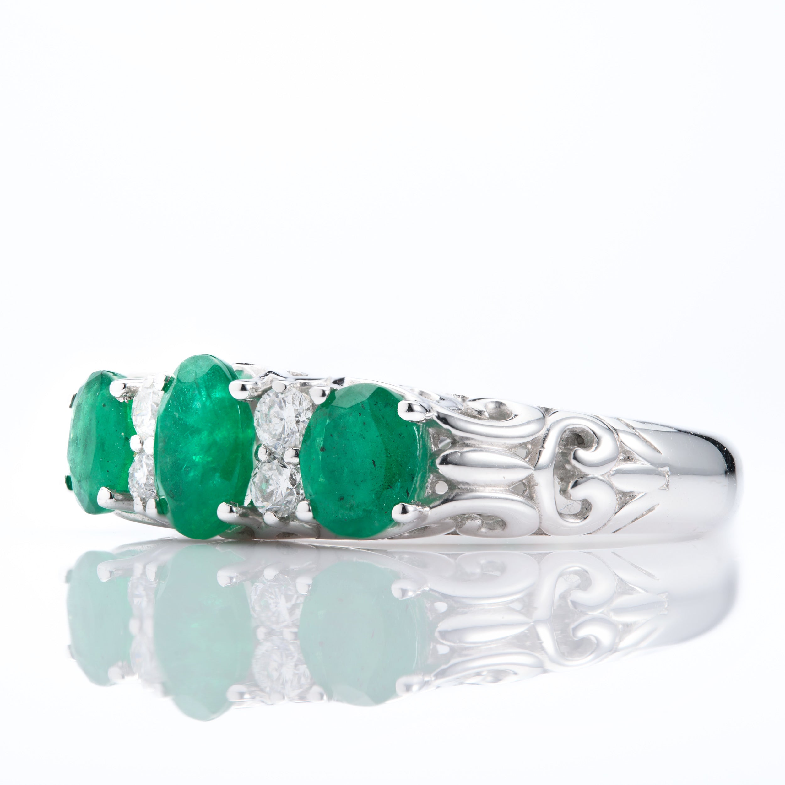 Platinum Oval Cut Emerald & Round Brilliant Cut Diamond 7-Stone Ring