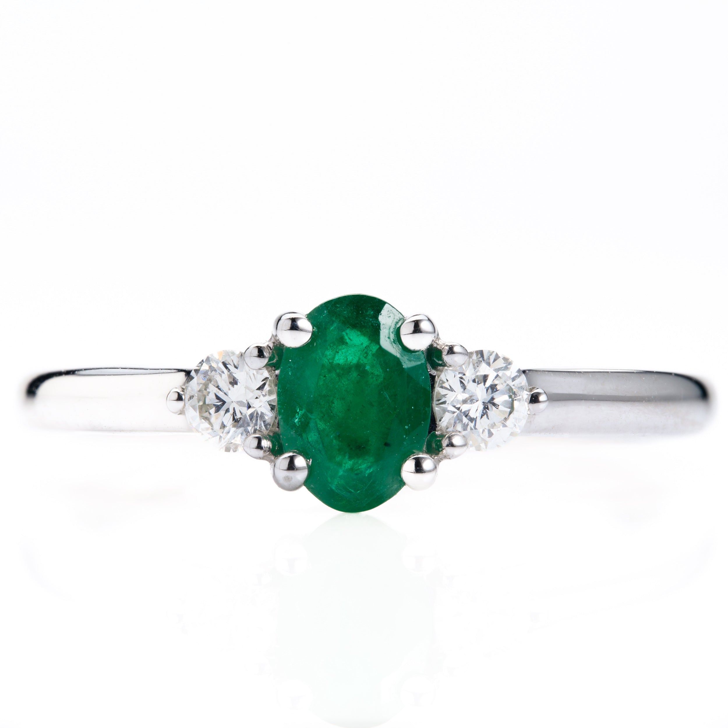 Platinum Oval Cut Emerald & Round Brilliant Cut Diamond Trilogy Ring