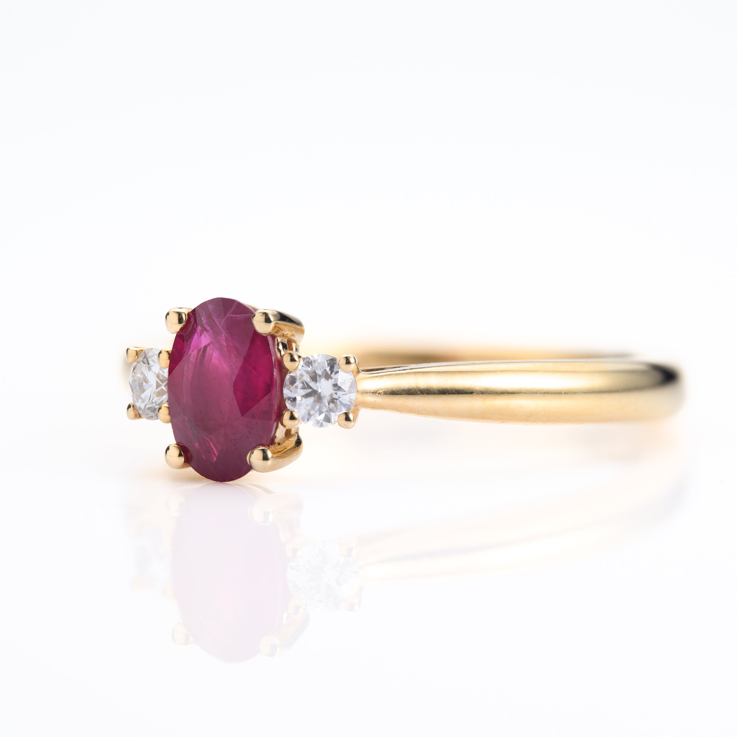 18ct Yellow Gold Oval Cut Ruby & Round Brilliant Cut Diamond Trilogy Ring
