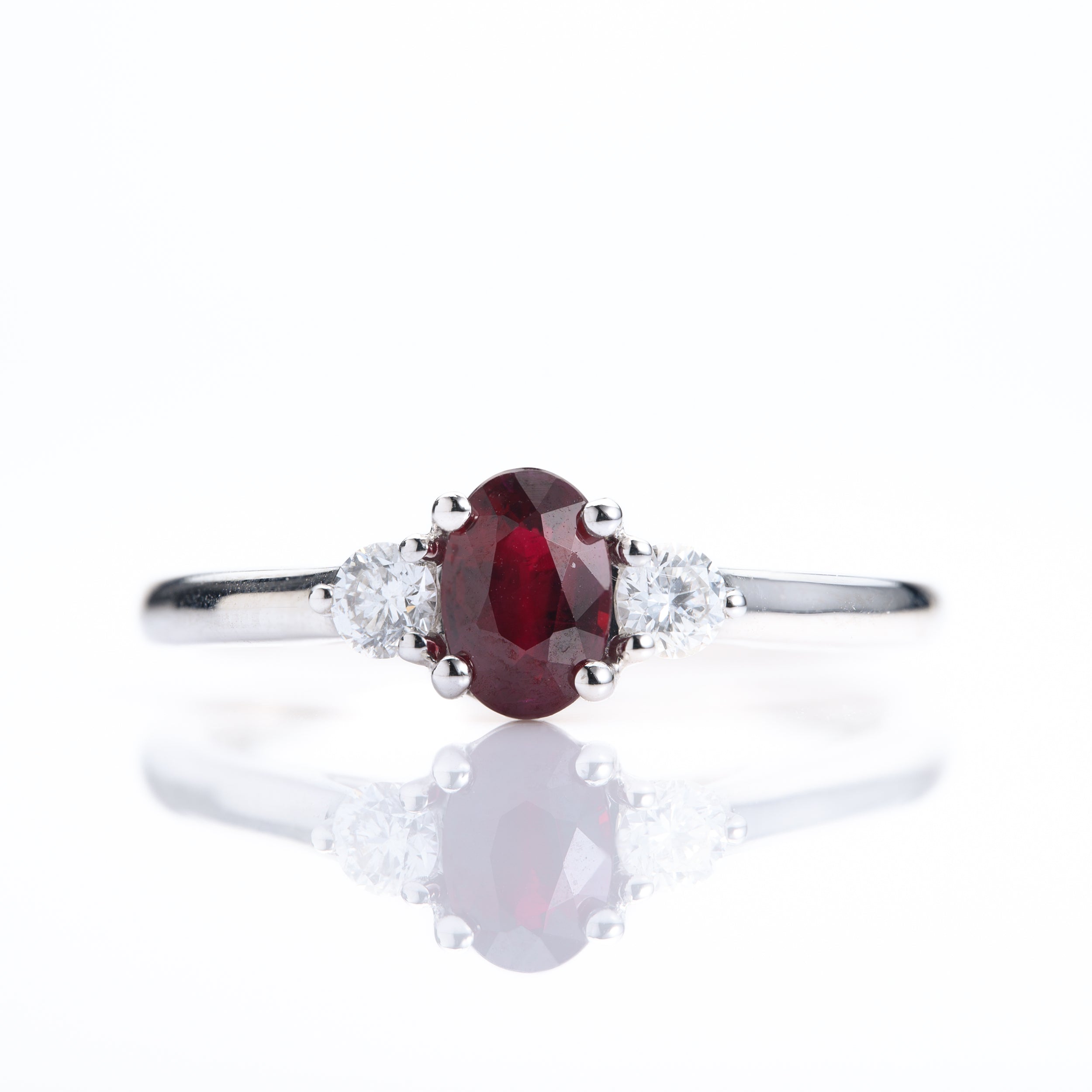 Platinum Oval Cut Ruby & Round Brilliant Cut Diamond Trilogy Ring