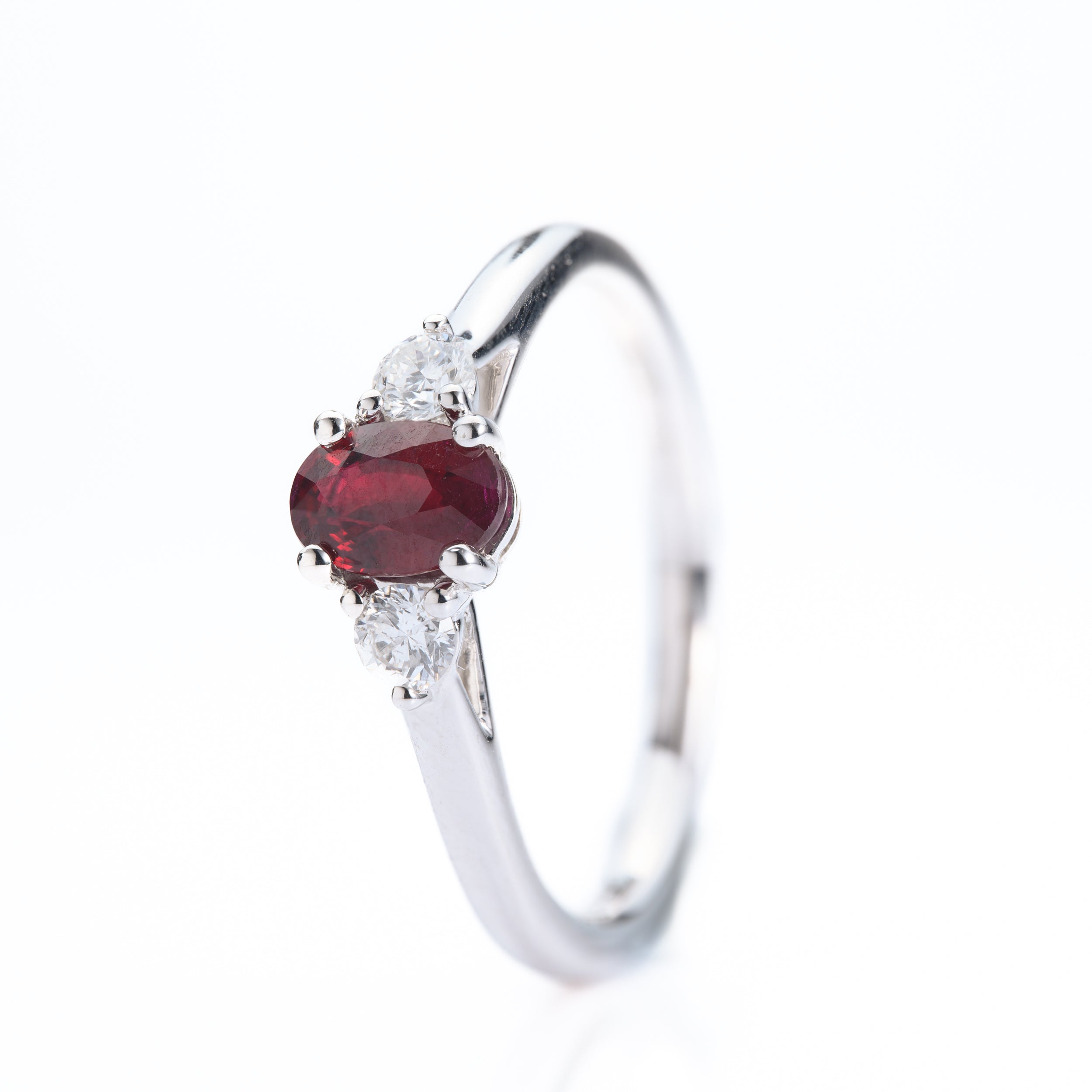 Platinum Oval Cut Ruby & Round Brilliant Cut Diamond Trilogy Ring