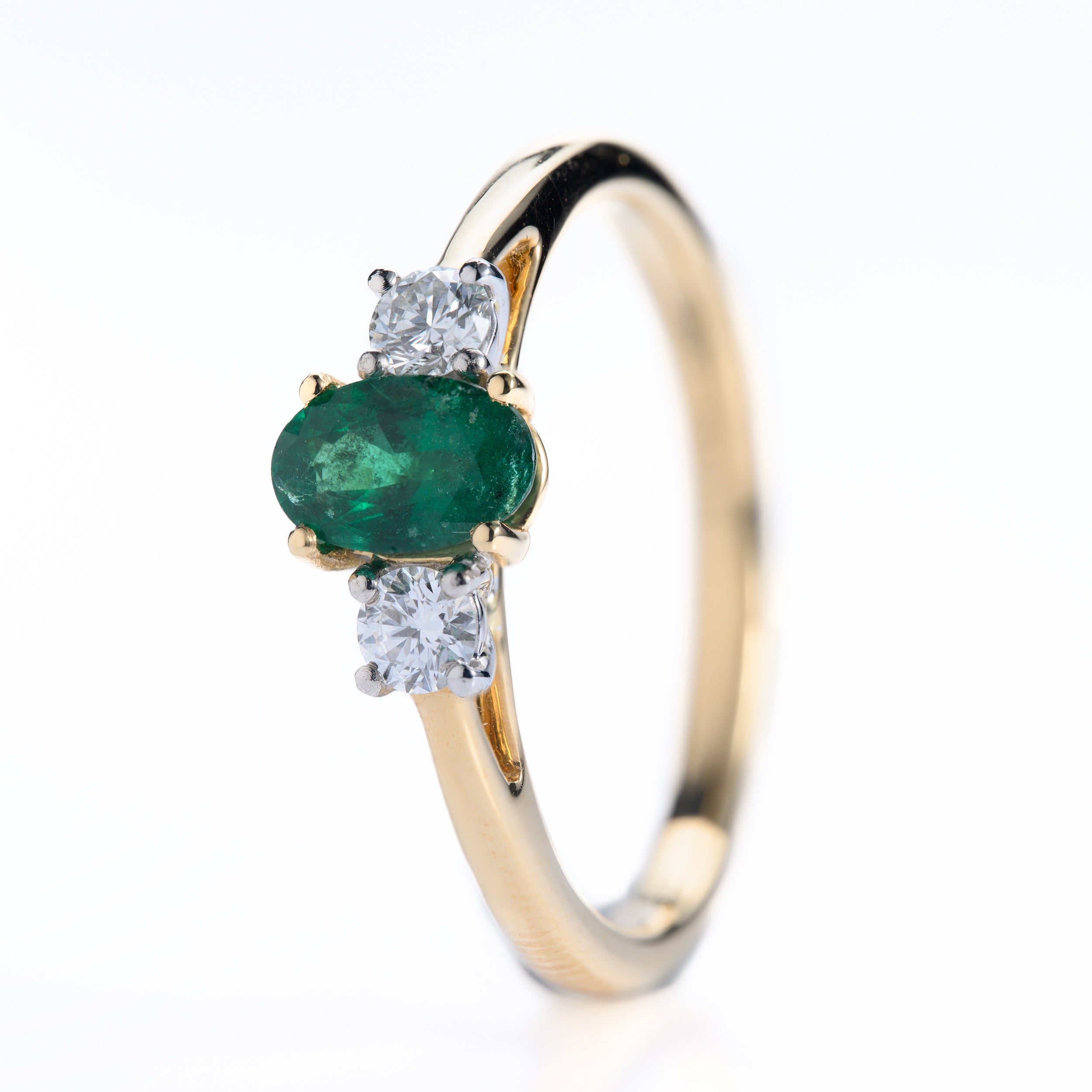 18ct Yellow Gold & Platinum Oval Cut Emerald & Round Brilliant Cut Diamond Trilogy Ring
