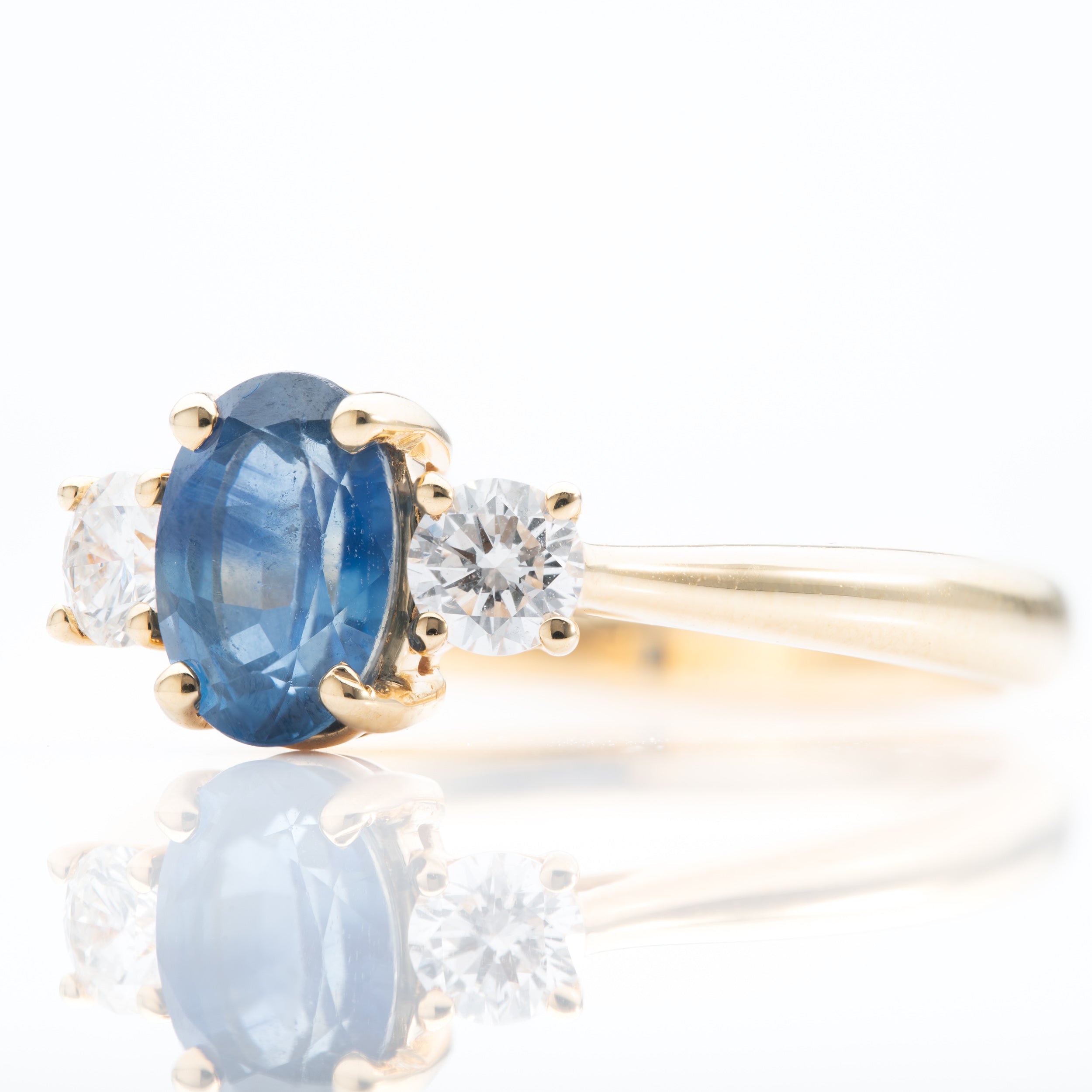 18ct Yellow Gold Oval Cut Sapphire & Brilliant Cut Diamond Trilogy Ring