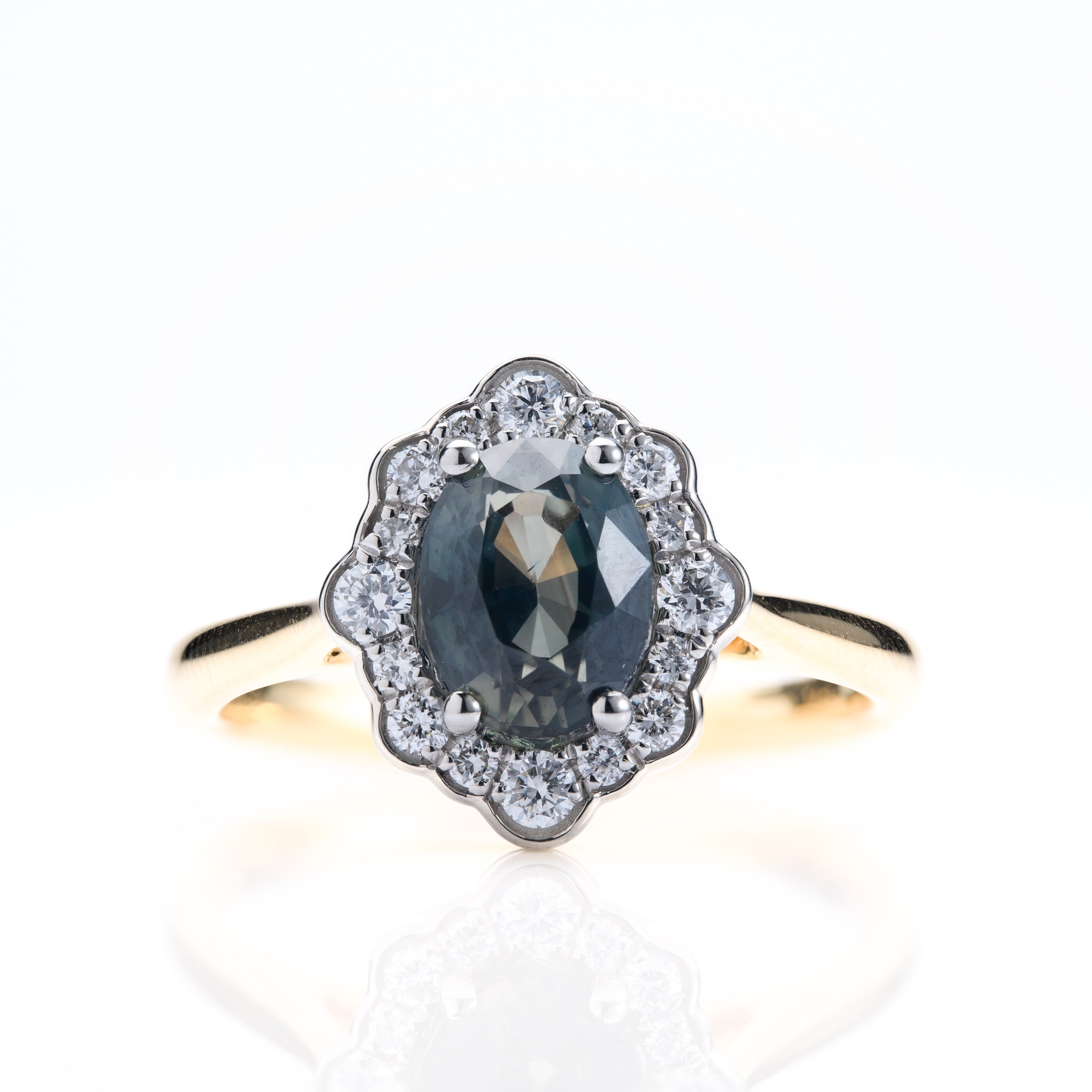 18ct Yellow Gold & Platinum Oval Cut Teal Sapphire & Round Brilliant Cut Diamond Cluster Ring
