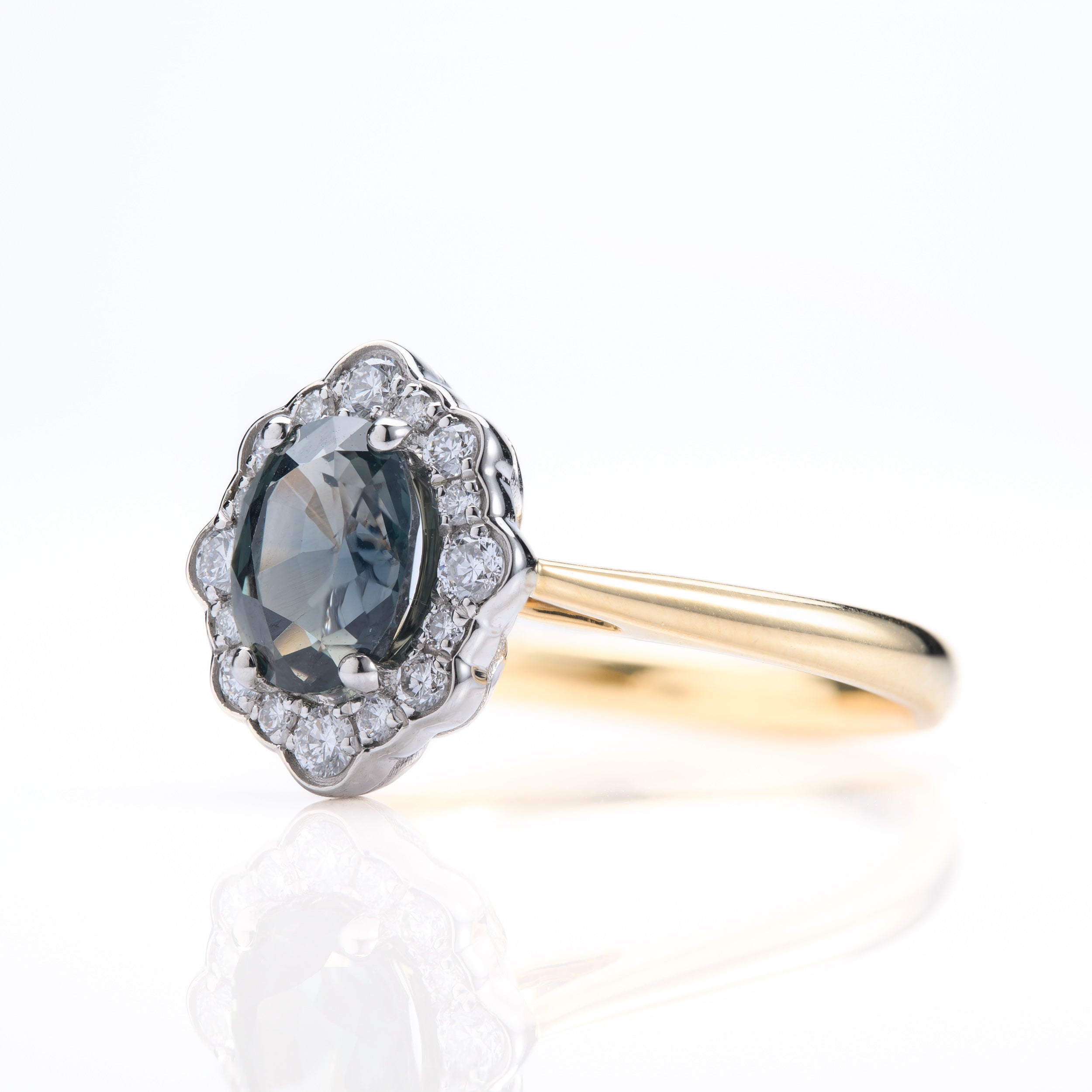 18ct Yellow Gold & Platinum Oval Cut Teal Sapphire & Round Brilliant Cut Diamond Cluster Ring