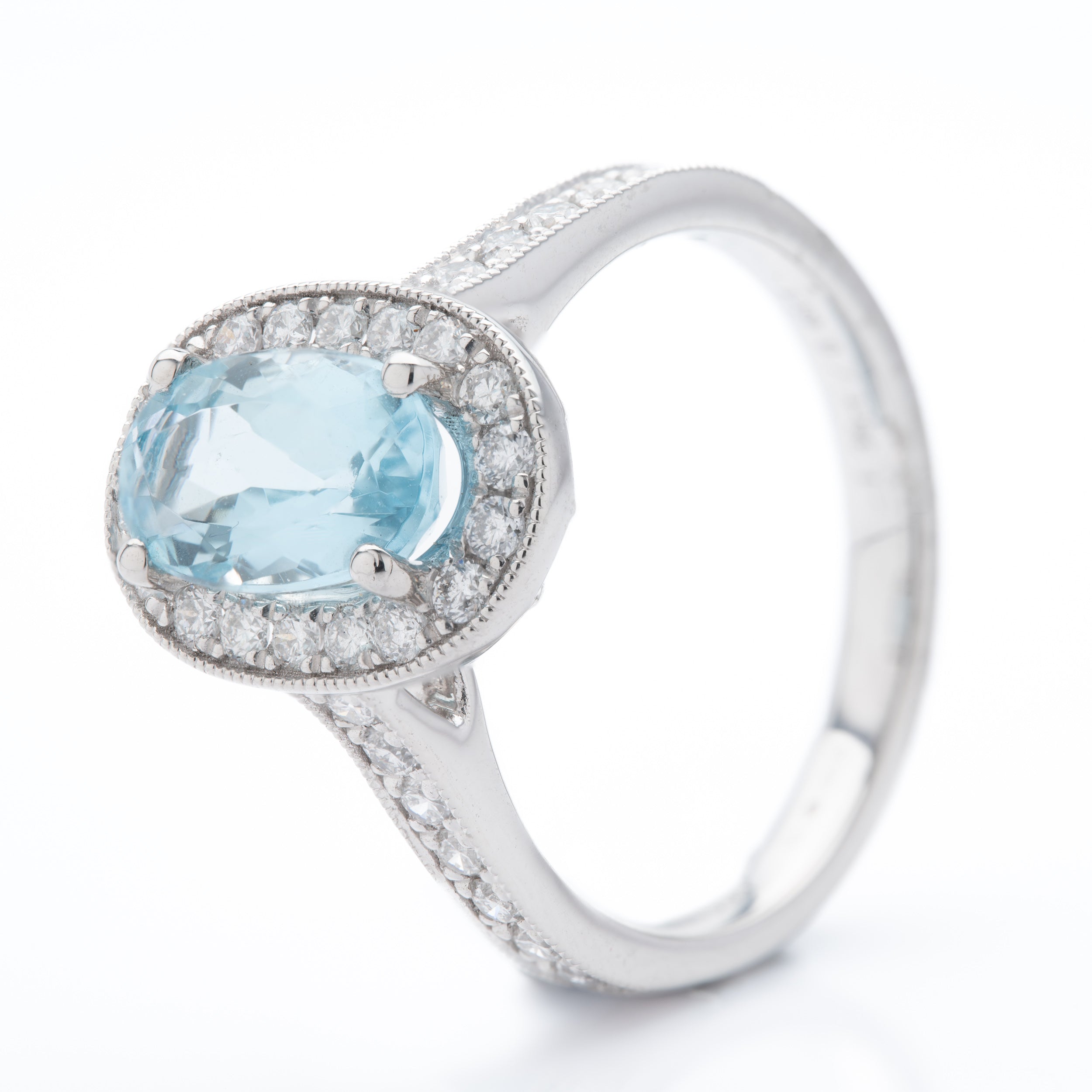 Platinum Oval Cut Aquamarine and Brilliant Round Cut Diamond Cluster Ring