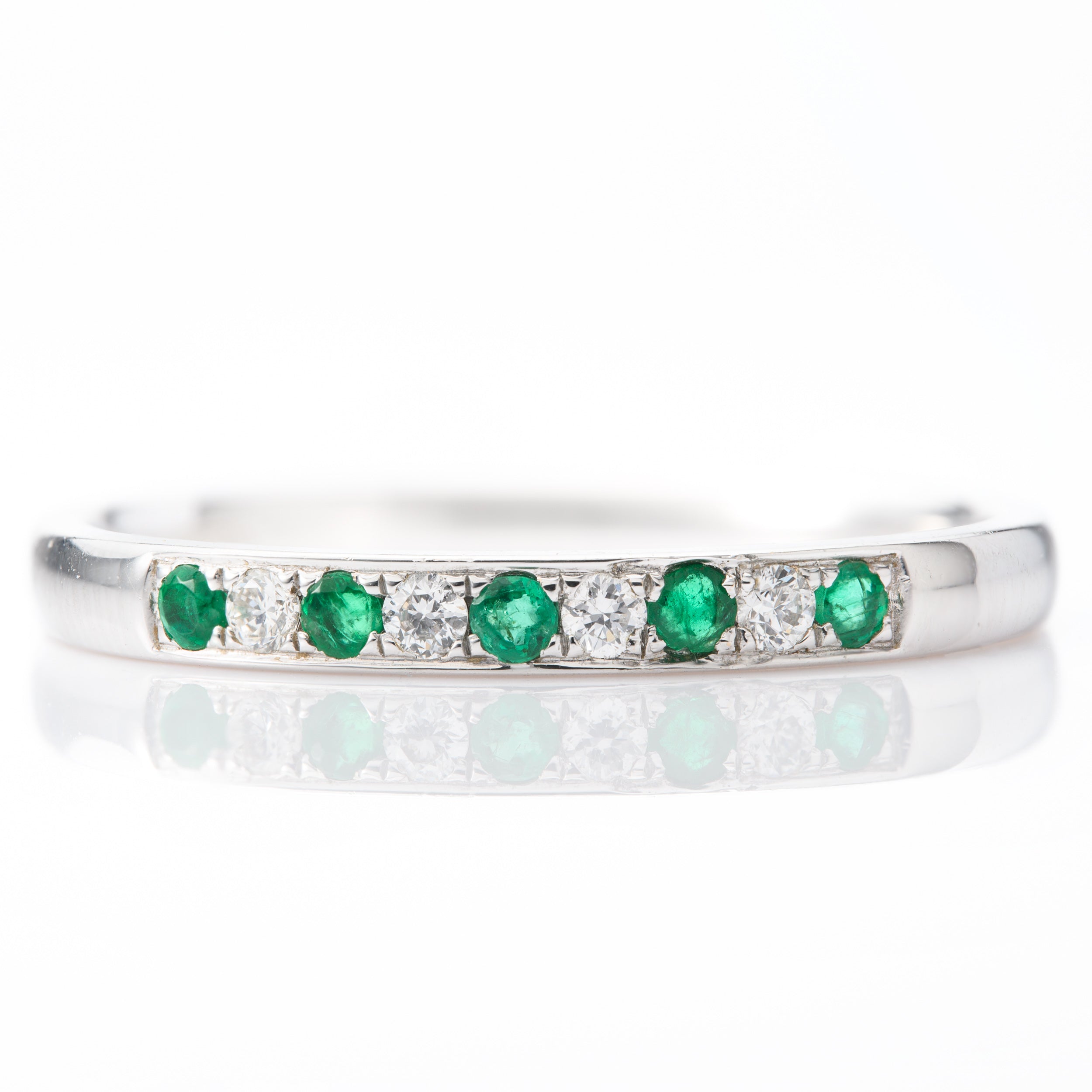 18ct White Gold Round Cut Emerald & Round Brilliant Cut Diamond 9-Stone Half Eternity Ring