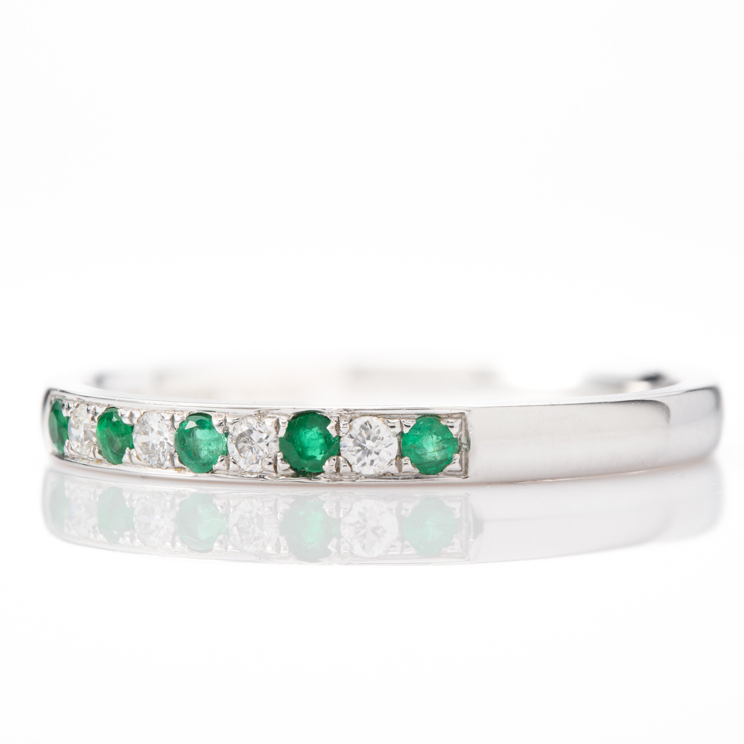 18ct White Gold Round Cut Emerald & Round Brilliant Cut Diamond 9-Stone Half Eternity Ring