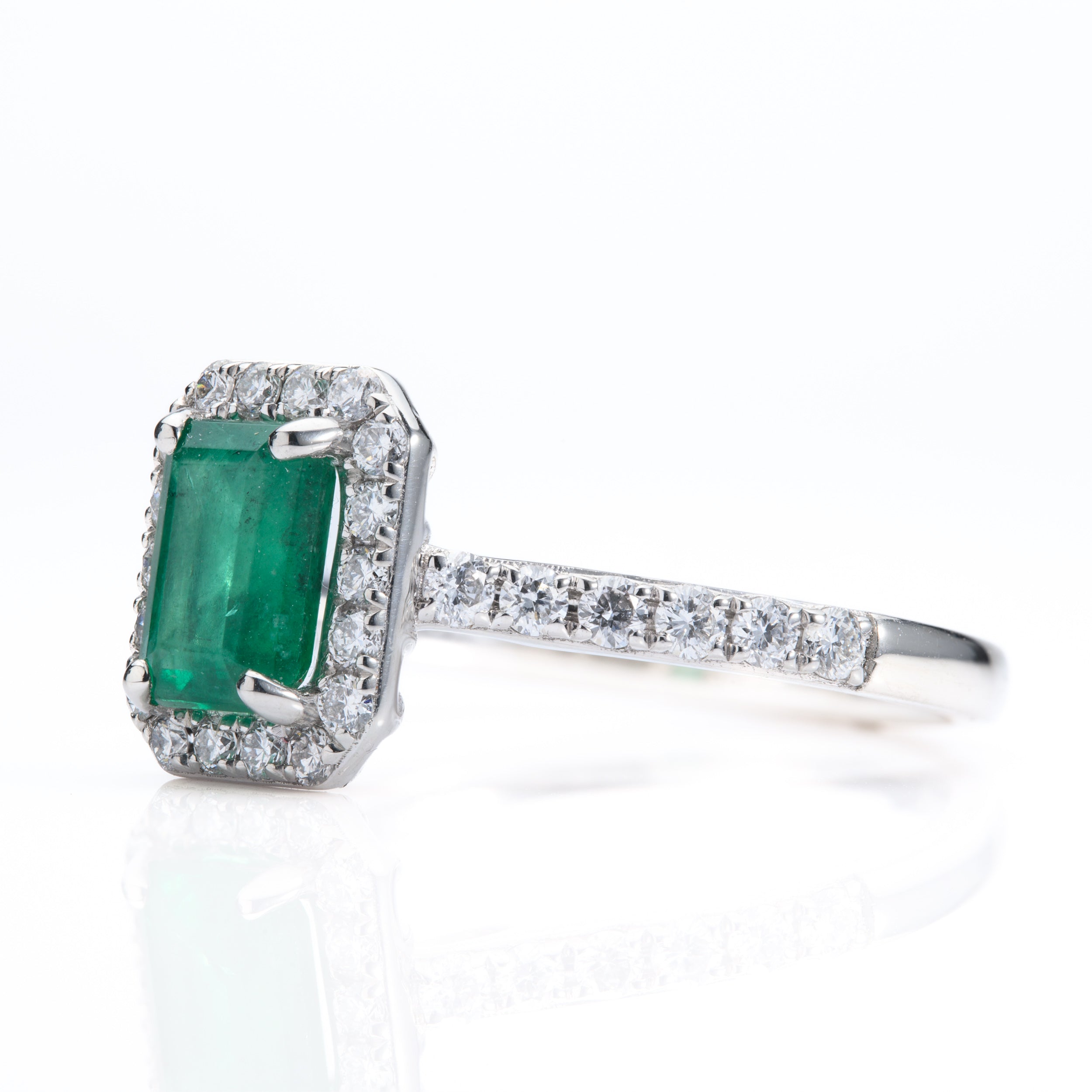 Platinum Rectangular Cut Emerald & Round Brilliant Cut Diamond Halo Cluster Ring with Diamond Shoulders