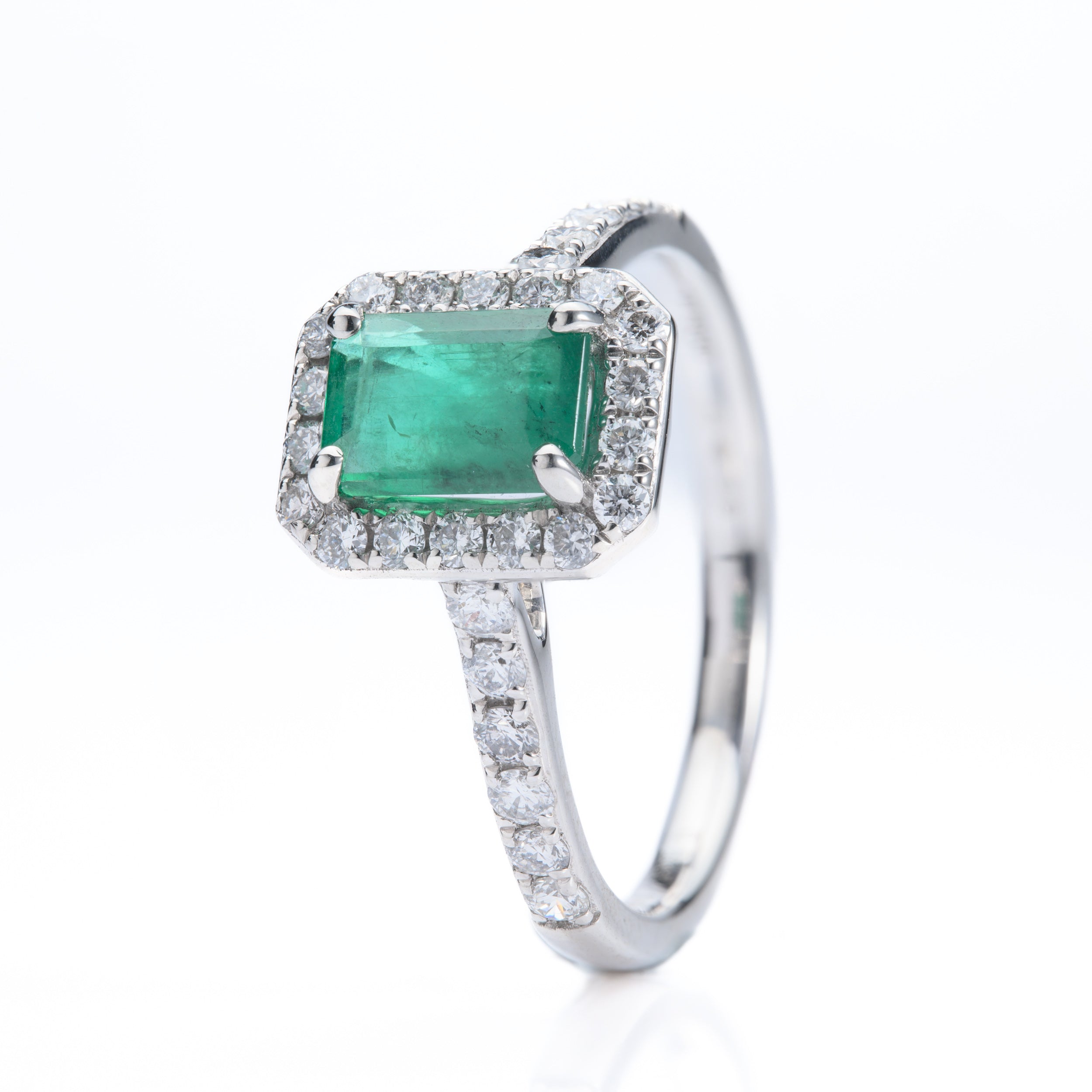 Platinum Rectangular Cut Emerald & Round Brilliant Cut Diamond Halo Cluster Ring with Diamond Shoulders