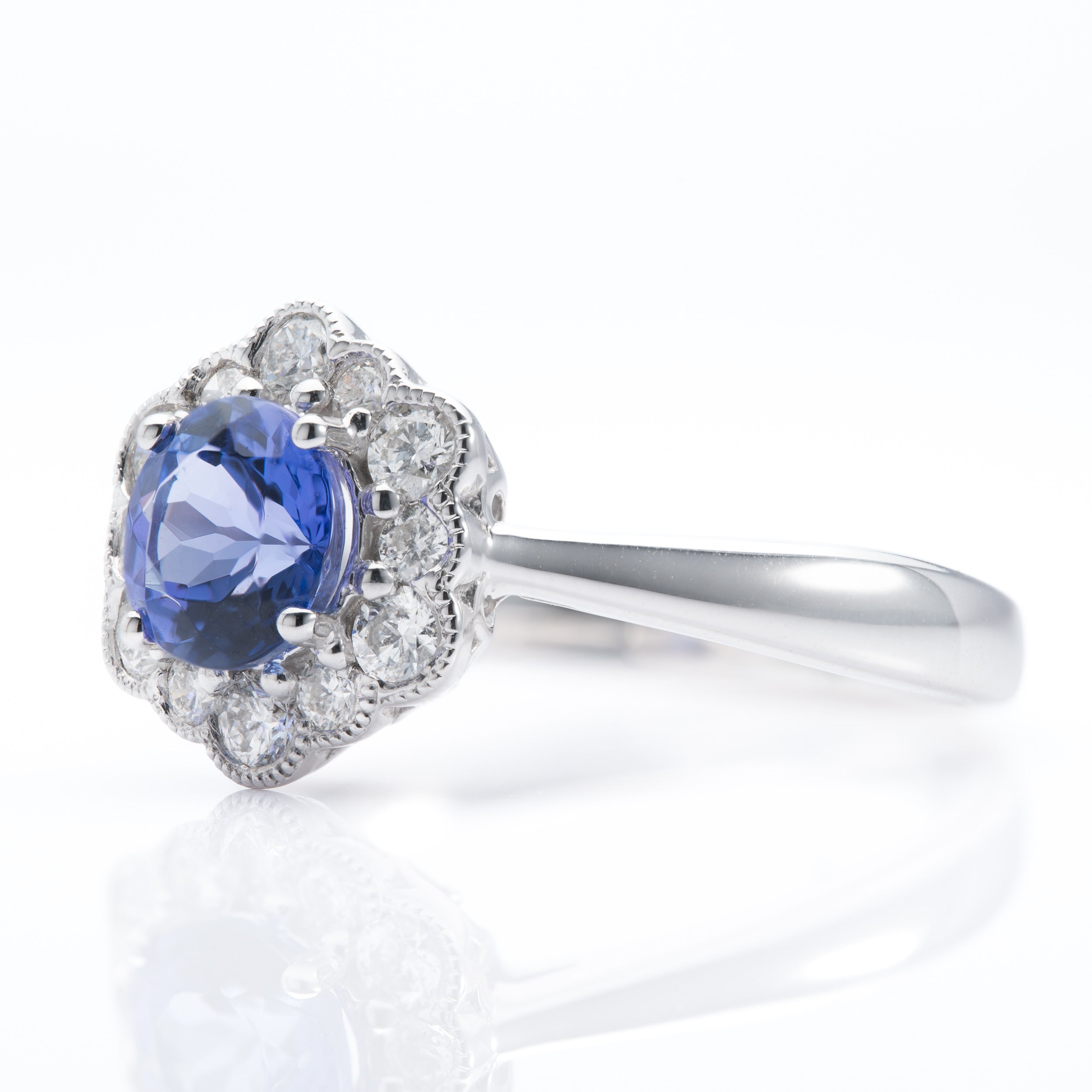Platinum Round Cut Tanzanite & Round Brilliant Cut Diamond Cluster Ring