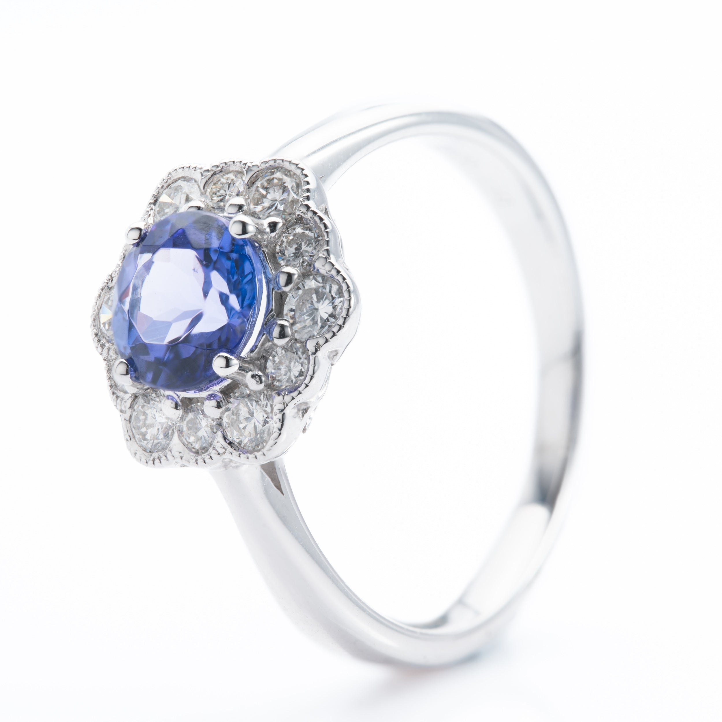 Platinum Round Cut Tanzanite & Round Brilliant Cut Diamond Cluster Ring