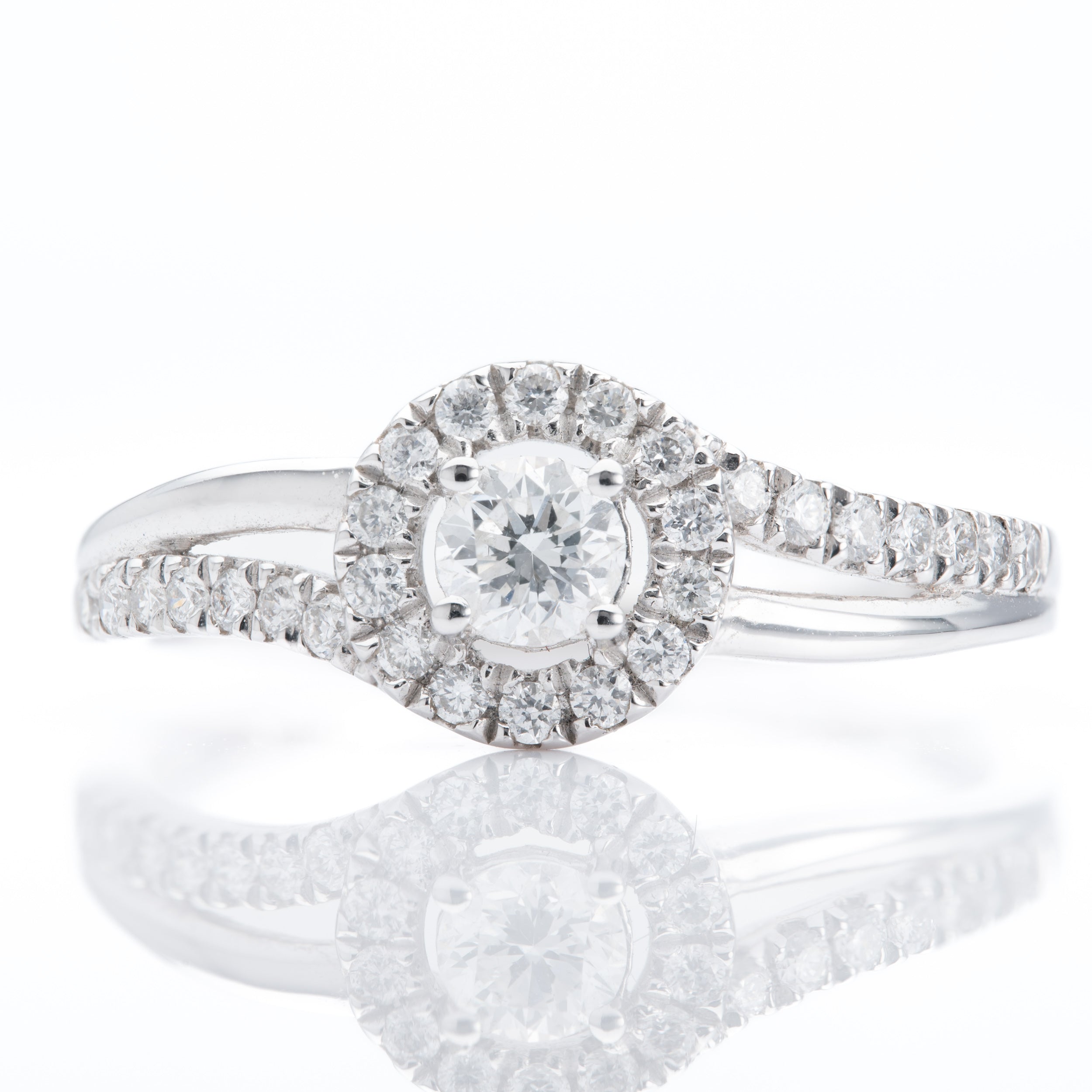 Platinum Twist Round Brilliant Cut Diamond Halo cluster Ring