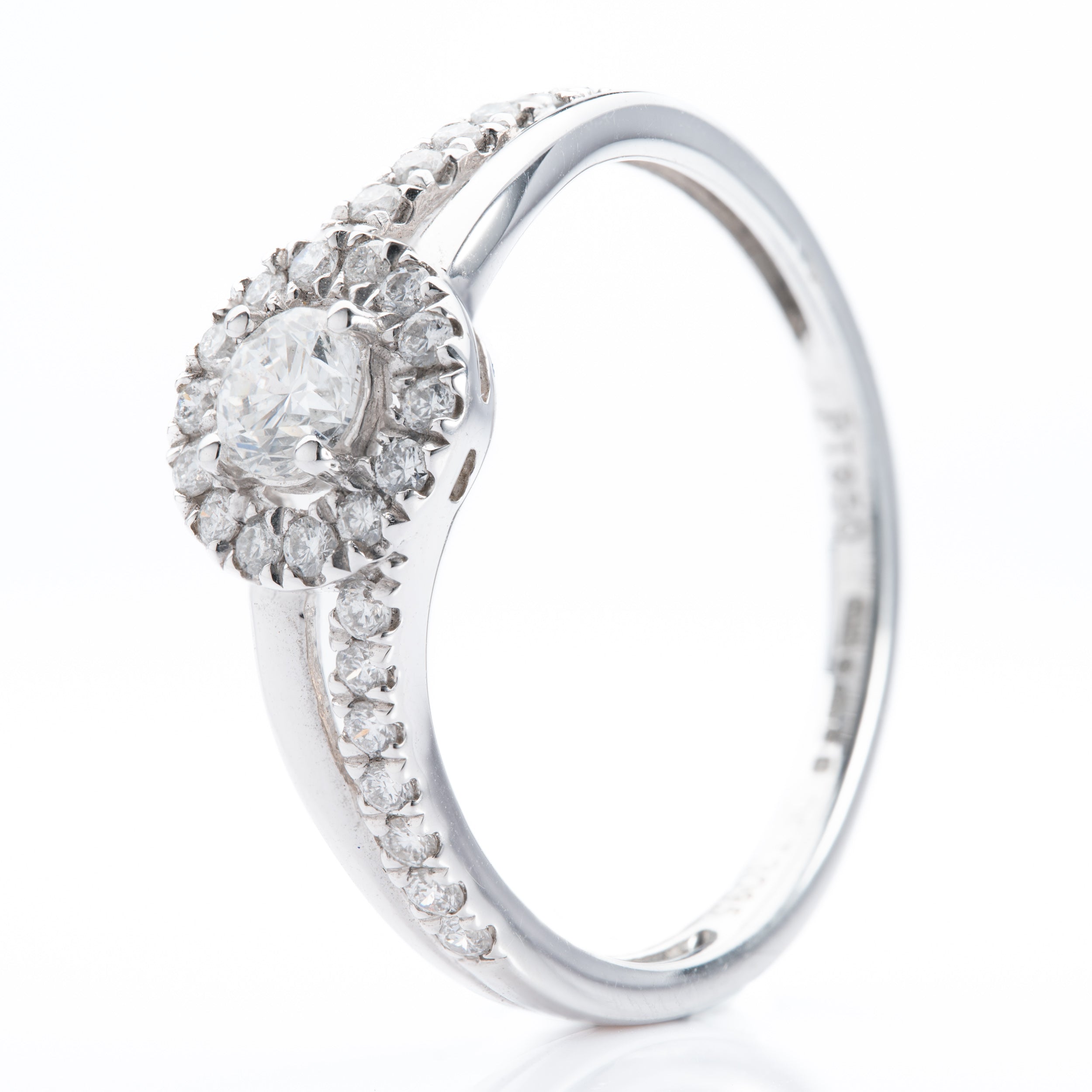 Platinum Twist Round Brilliant Cut Diamond Halo cluster Ring