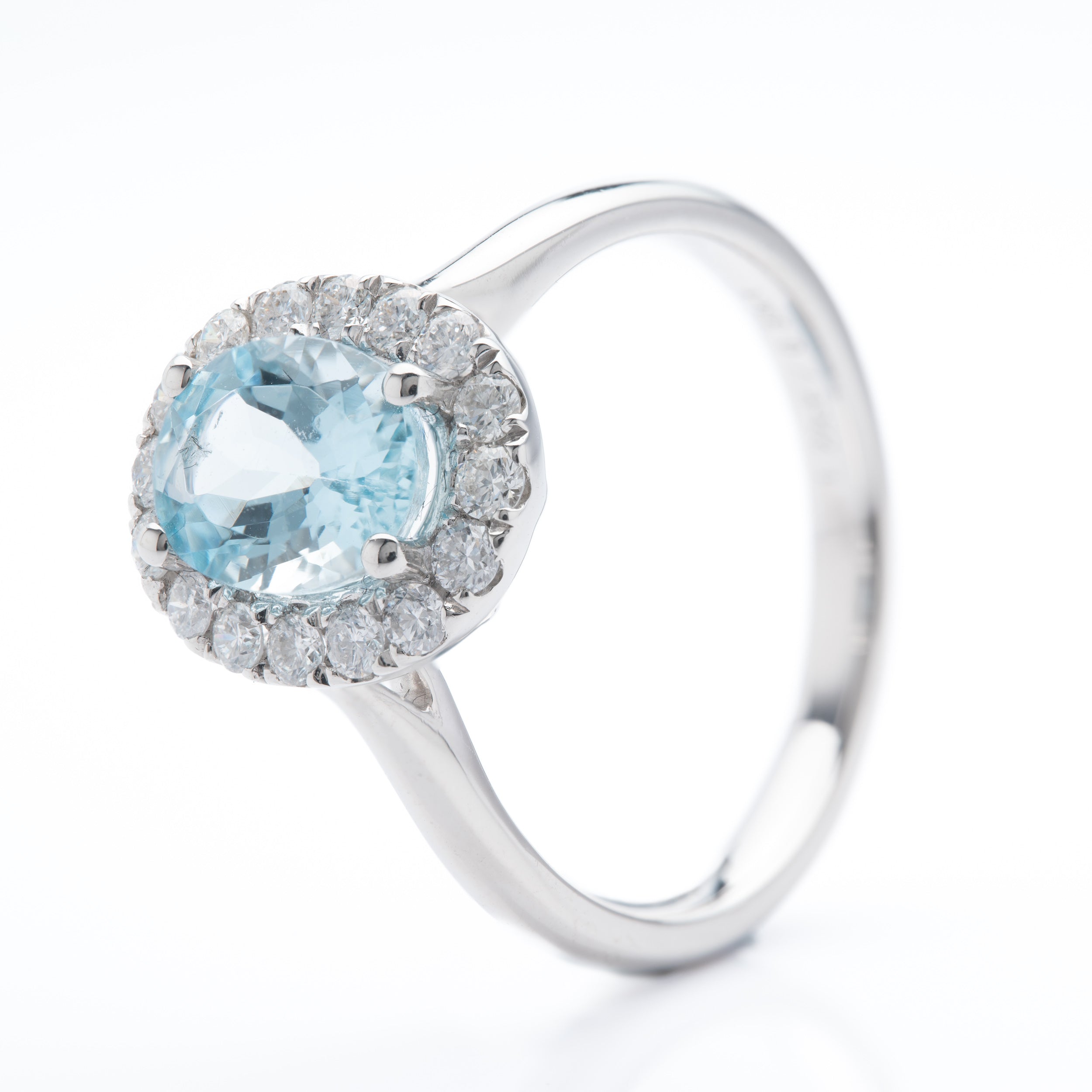 Platinum Oval Cut Aquamarine and Brilliant Cut Diamond Cluster Ring