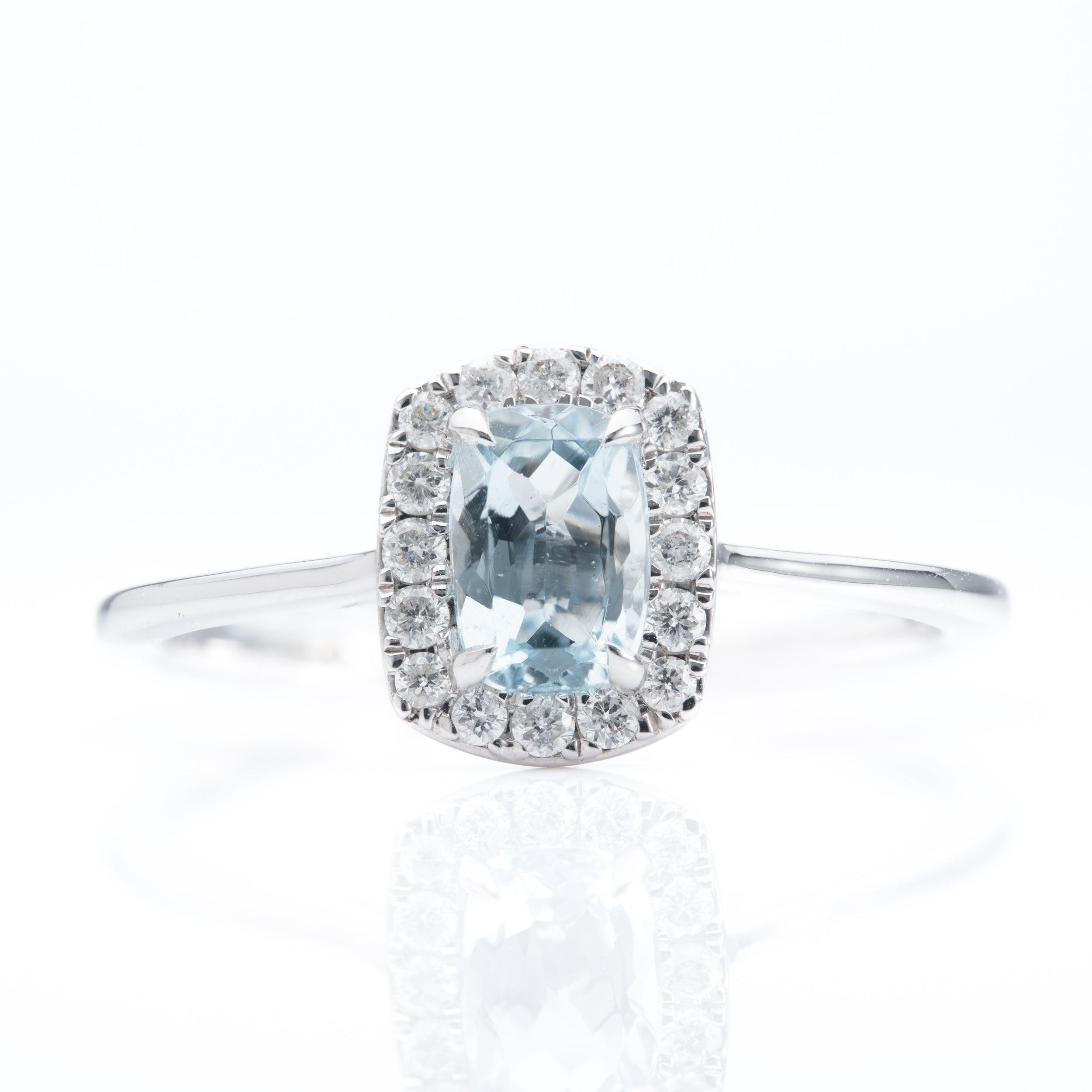 9ct White Gold Emerald cut Aquamarine and Diamond Halo ring