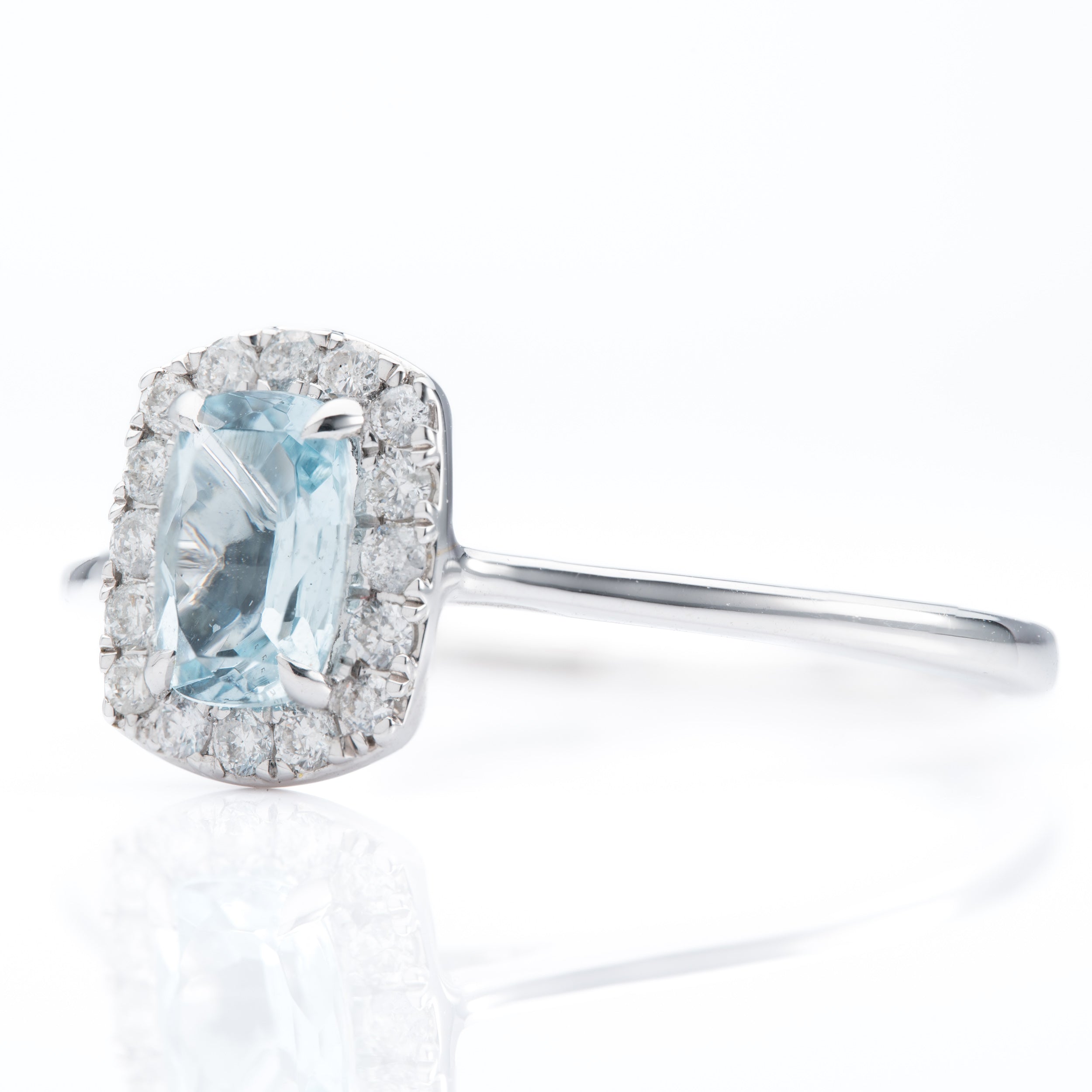 9ct White Gold Emerald cut Aquamarine and Diamond Halo ring