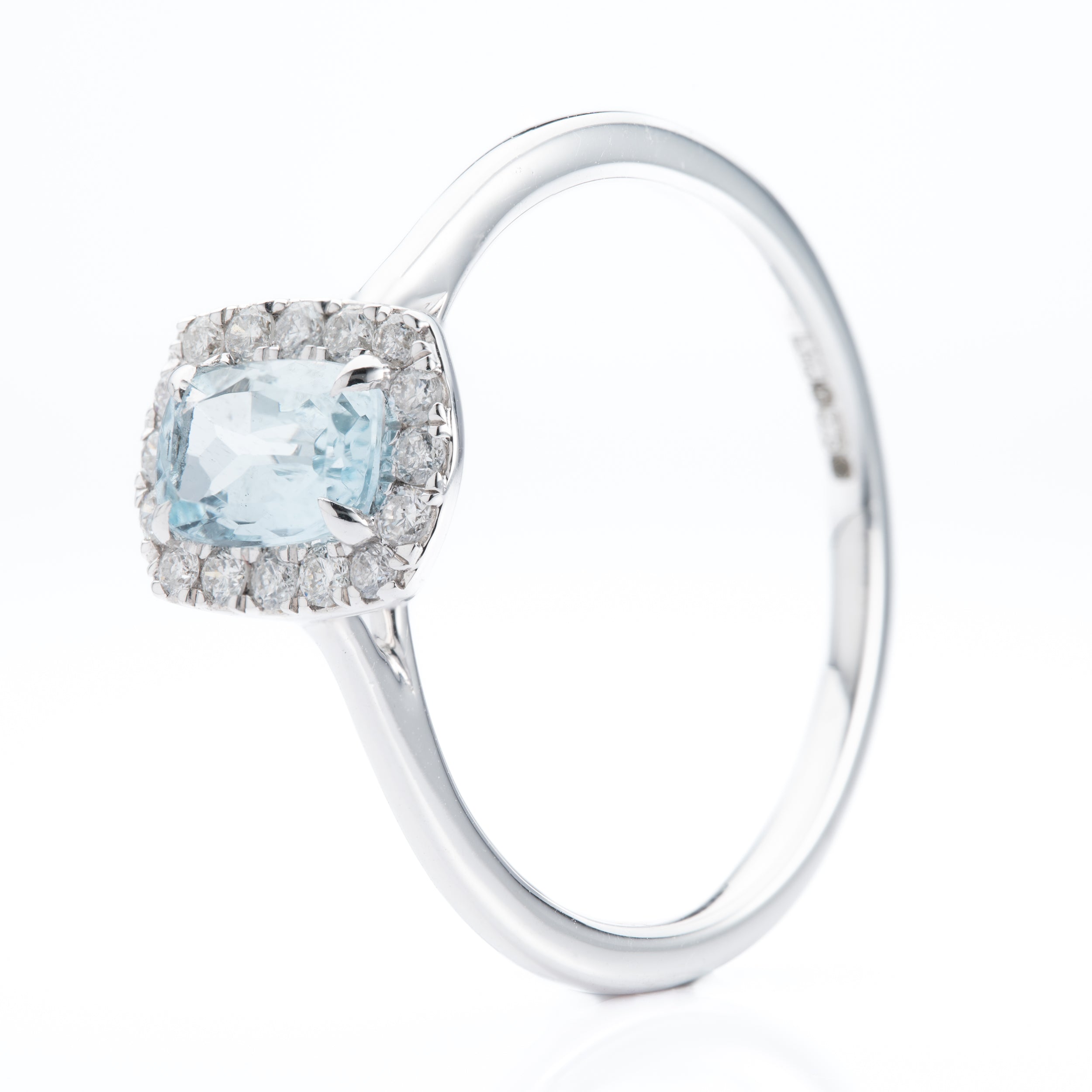 9ct White Gold Emerald cut Aquamarine and Diamond Halo ring