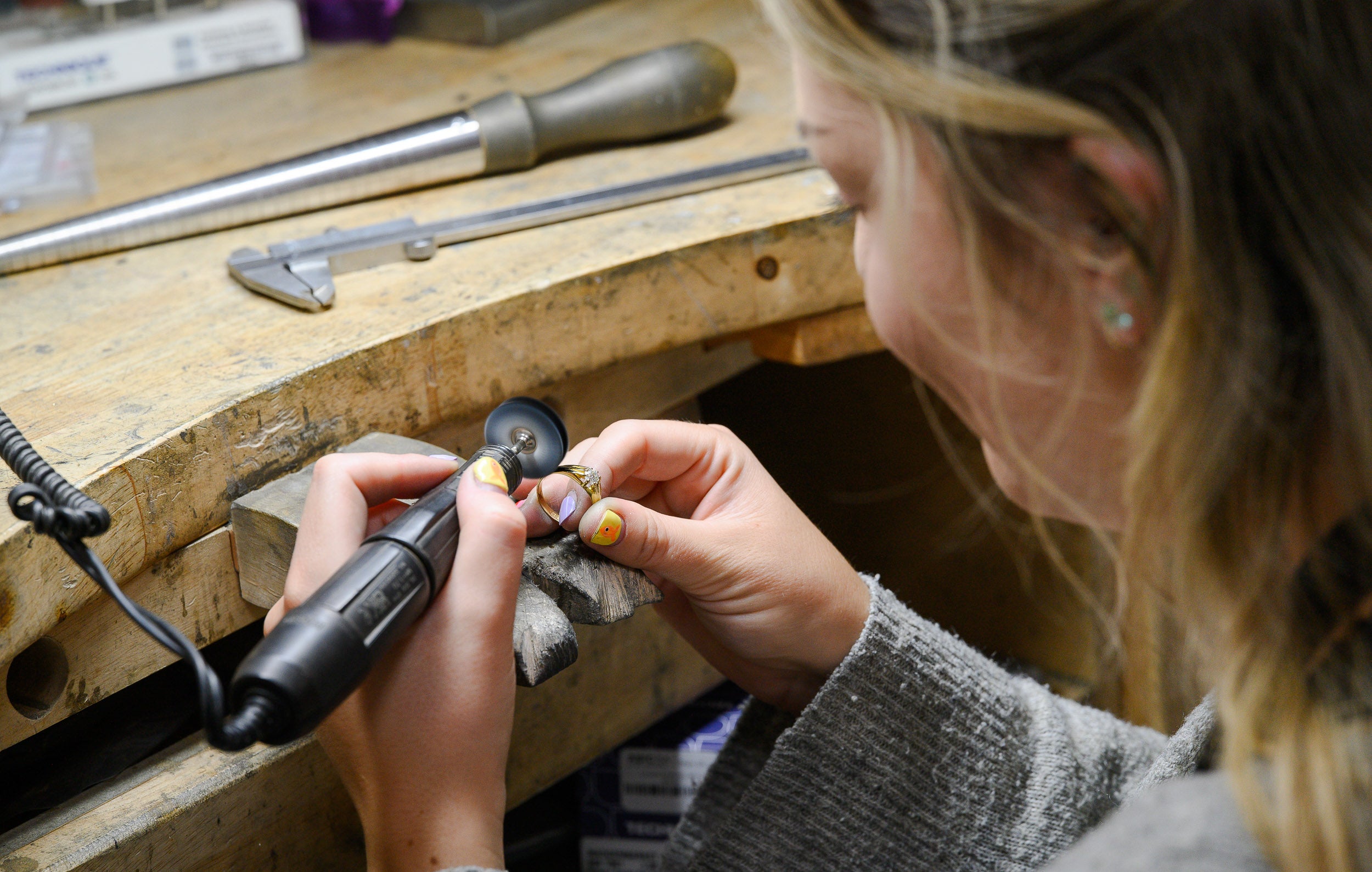 Maddermarket's Goldsmith Sarah Working on a ring in the shop's workshop