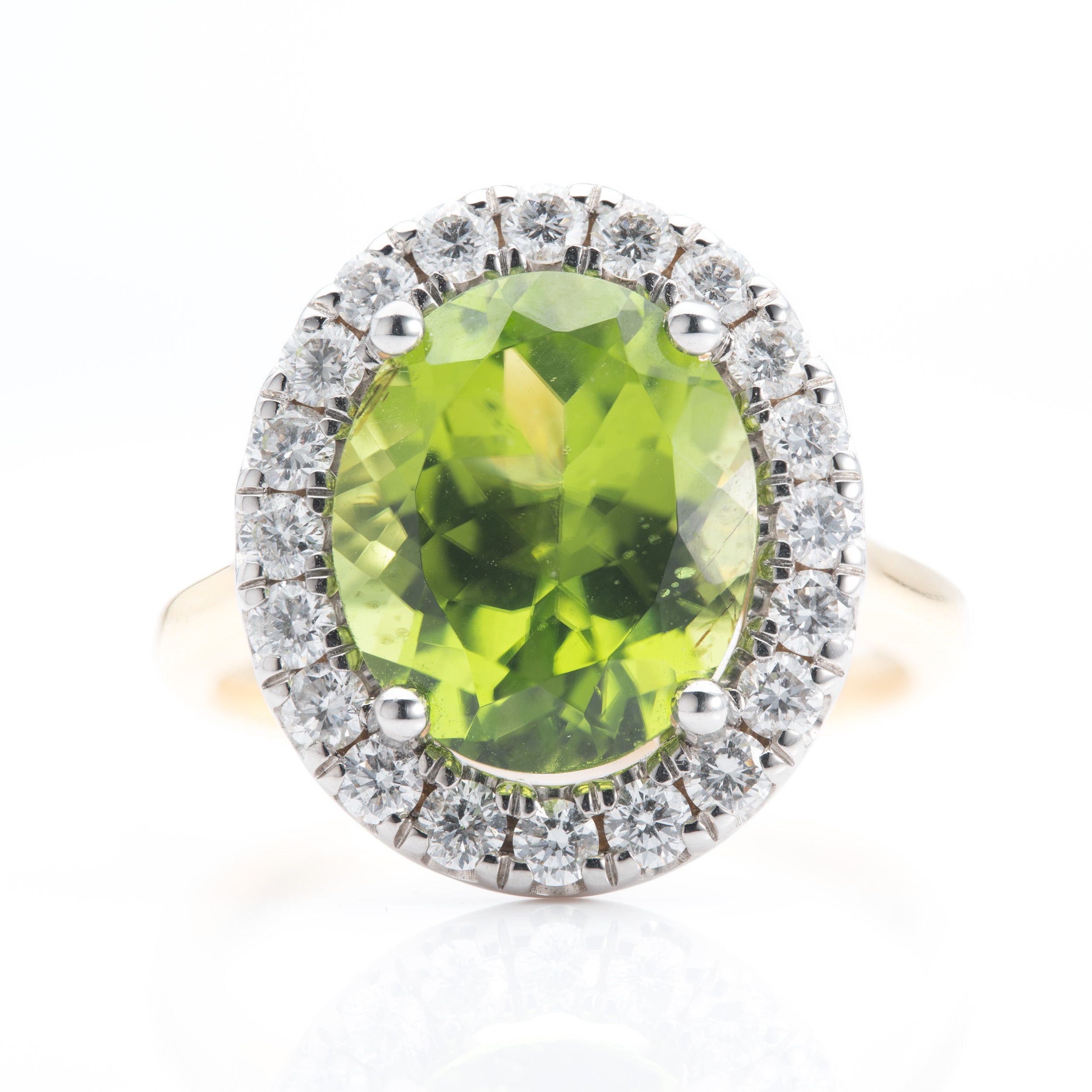 18ct Gold Oval Cut Peridot & Round Brilliant Cut Diamond Halo Cluster Ring