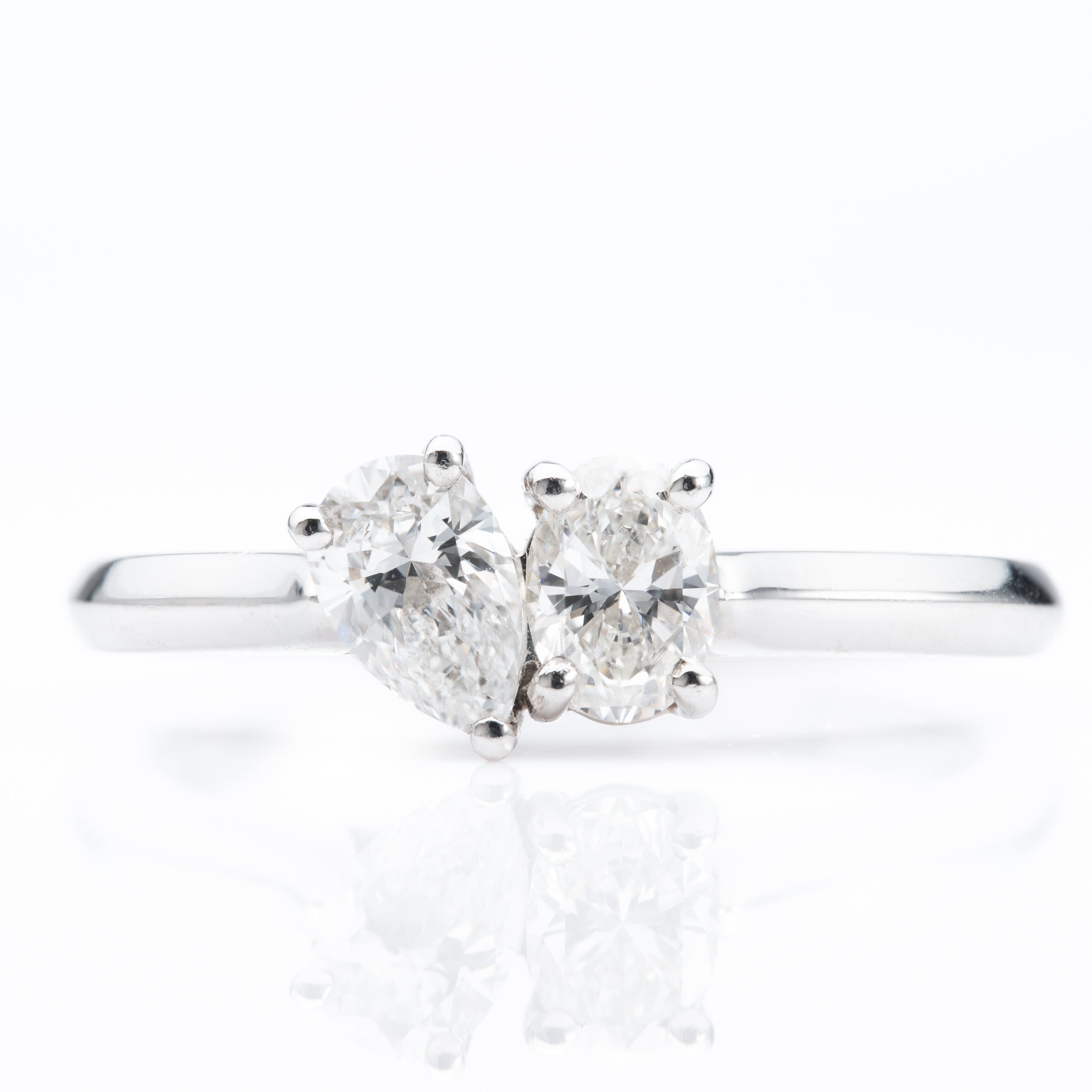 Platinum Pear and Oval Cut Diamond toi et moi Ring