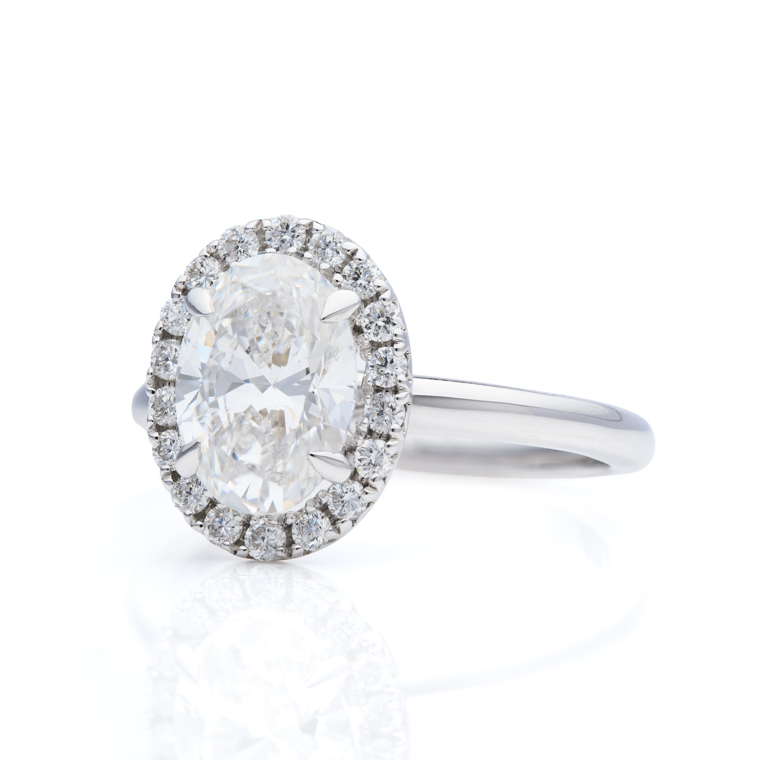 18ct White Gold Oval Cut Lab Grown Diamond and Brilliant Cut Lab Grown Diamond Halo Cluster Ring