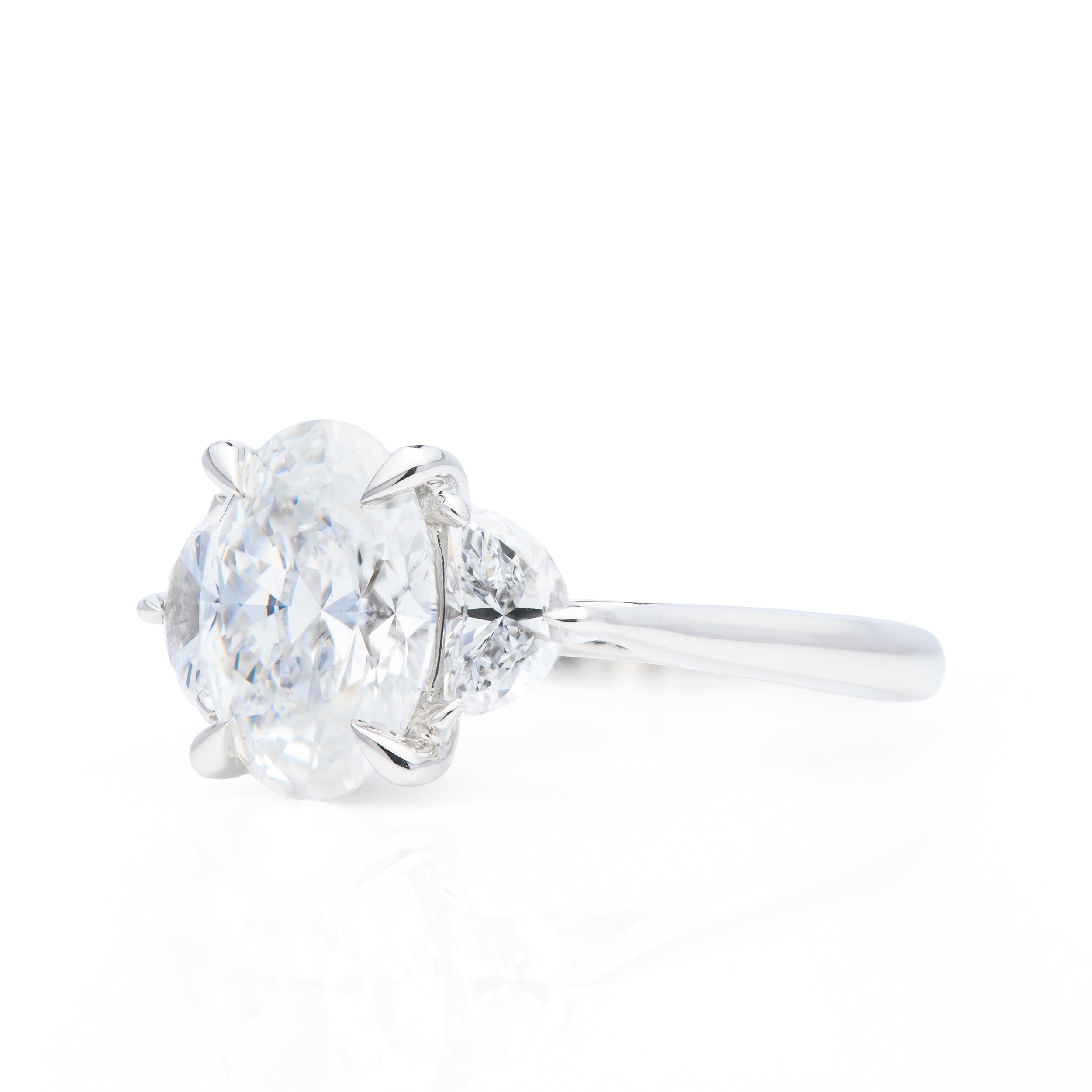 Platinum Oval Cut and Half-Moon Cut Lab Grown Diamond Trilogy Ring