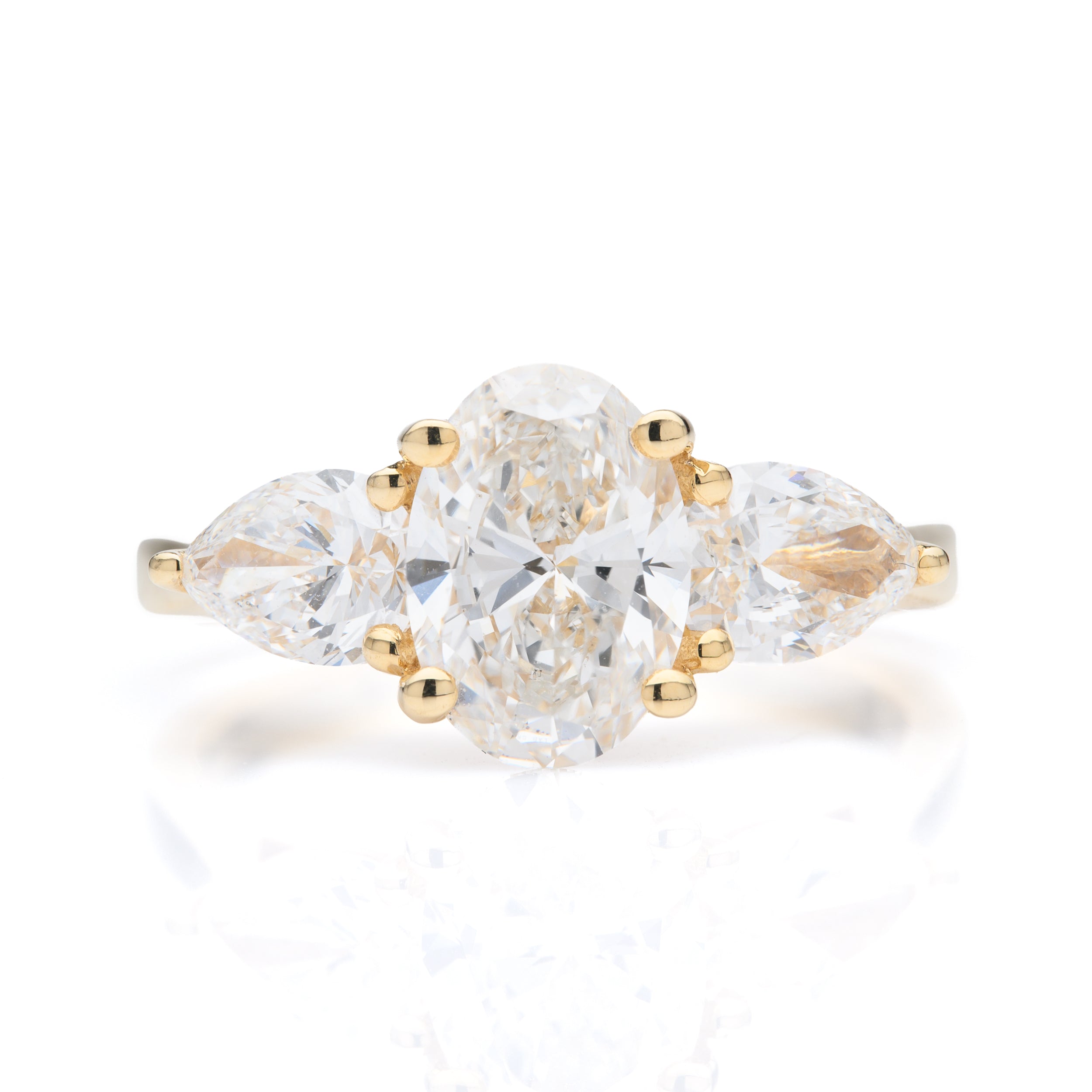 18ct Yellow Gold Oval Cut Lab Grown Diamond and Pear Cut Shoulder Lab Grown Diamond Trilogy Ring