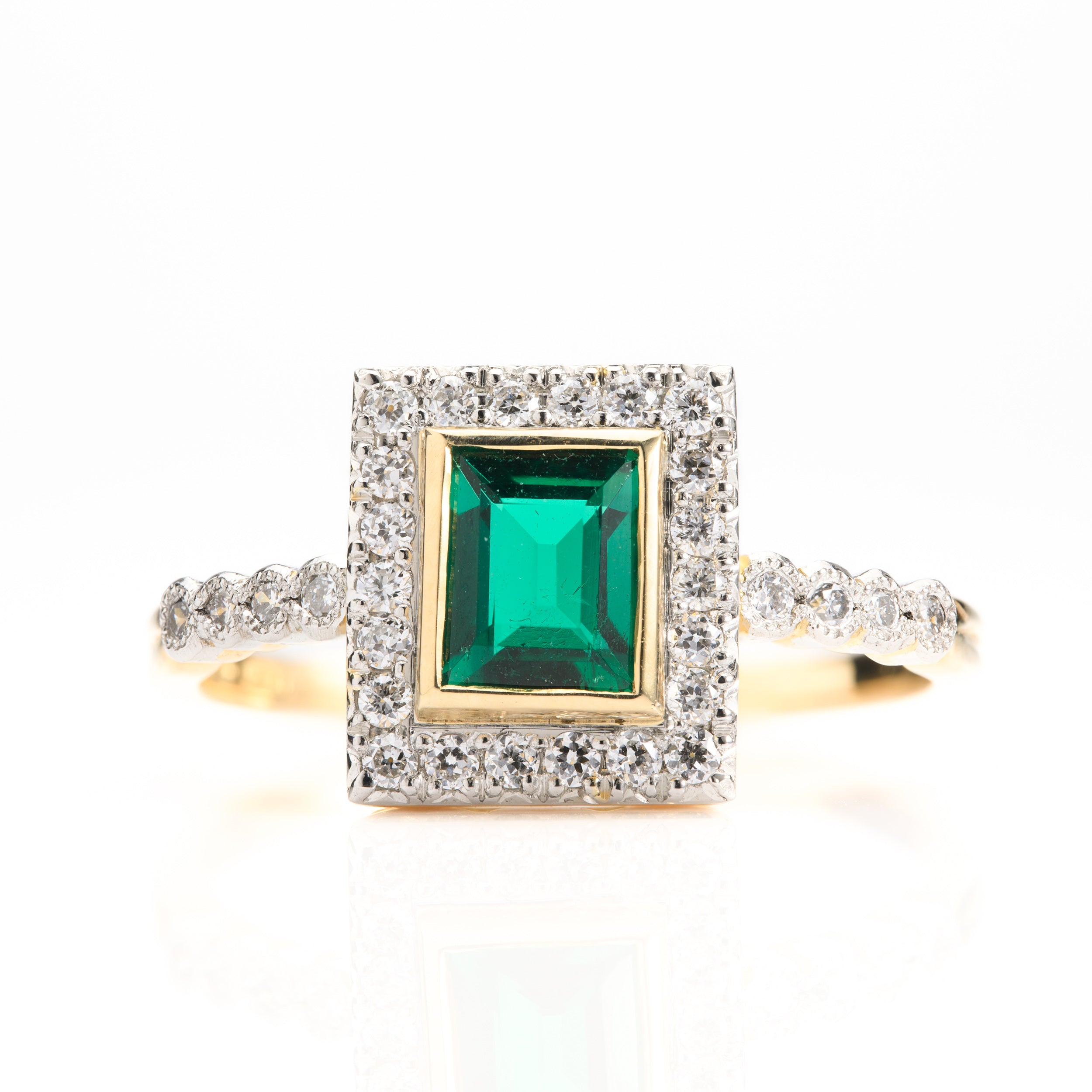 18ct Yellow Gold & Platinum Rectangular Cut Emerald & Round Brilliant Cut Diamond Halo Cluster Ring