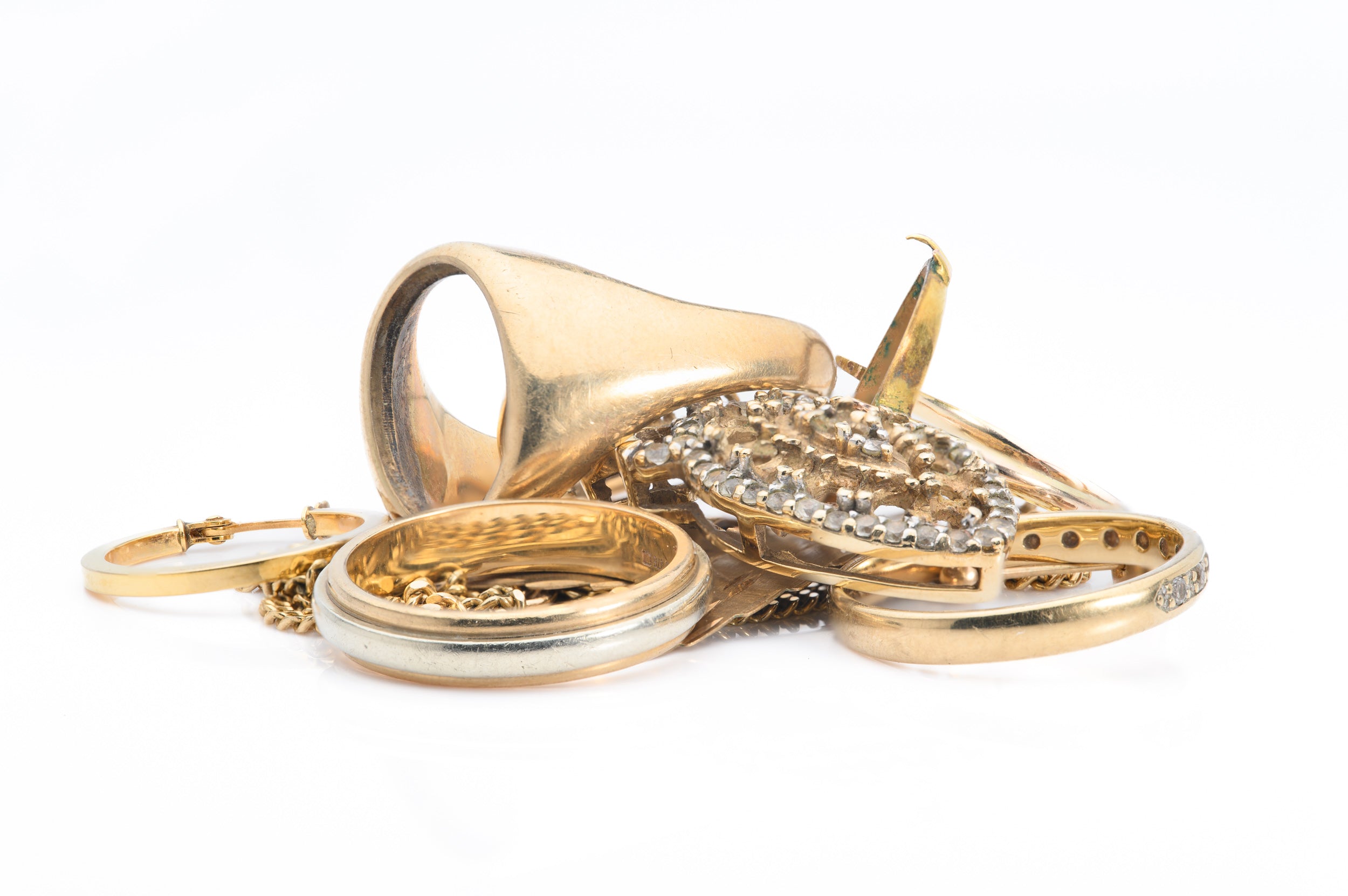 A small pile of scrap gold jewellery