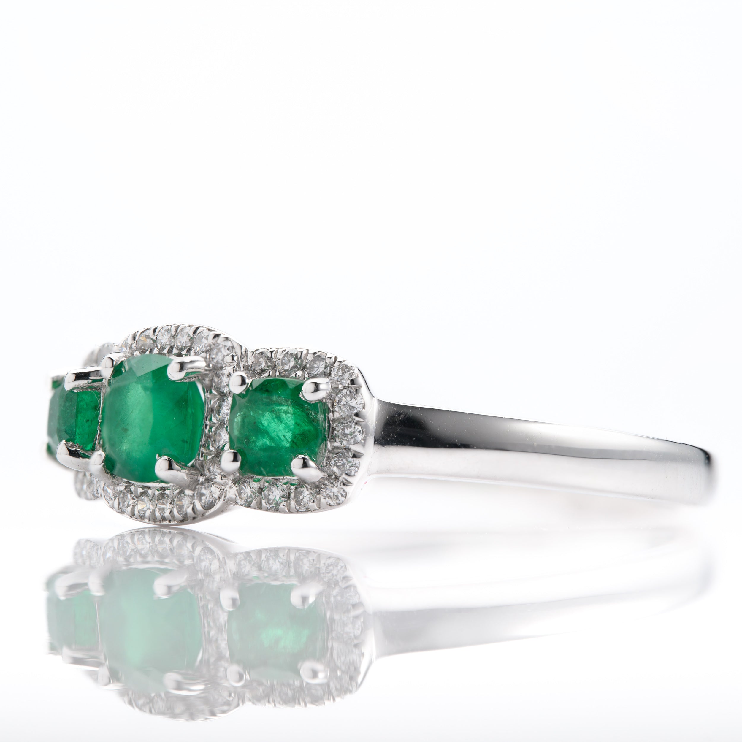 Platinum Cushion Cut Emerald & Round Brilliant Cut Diamond Triple Halo Cluster Ring