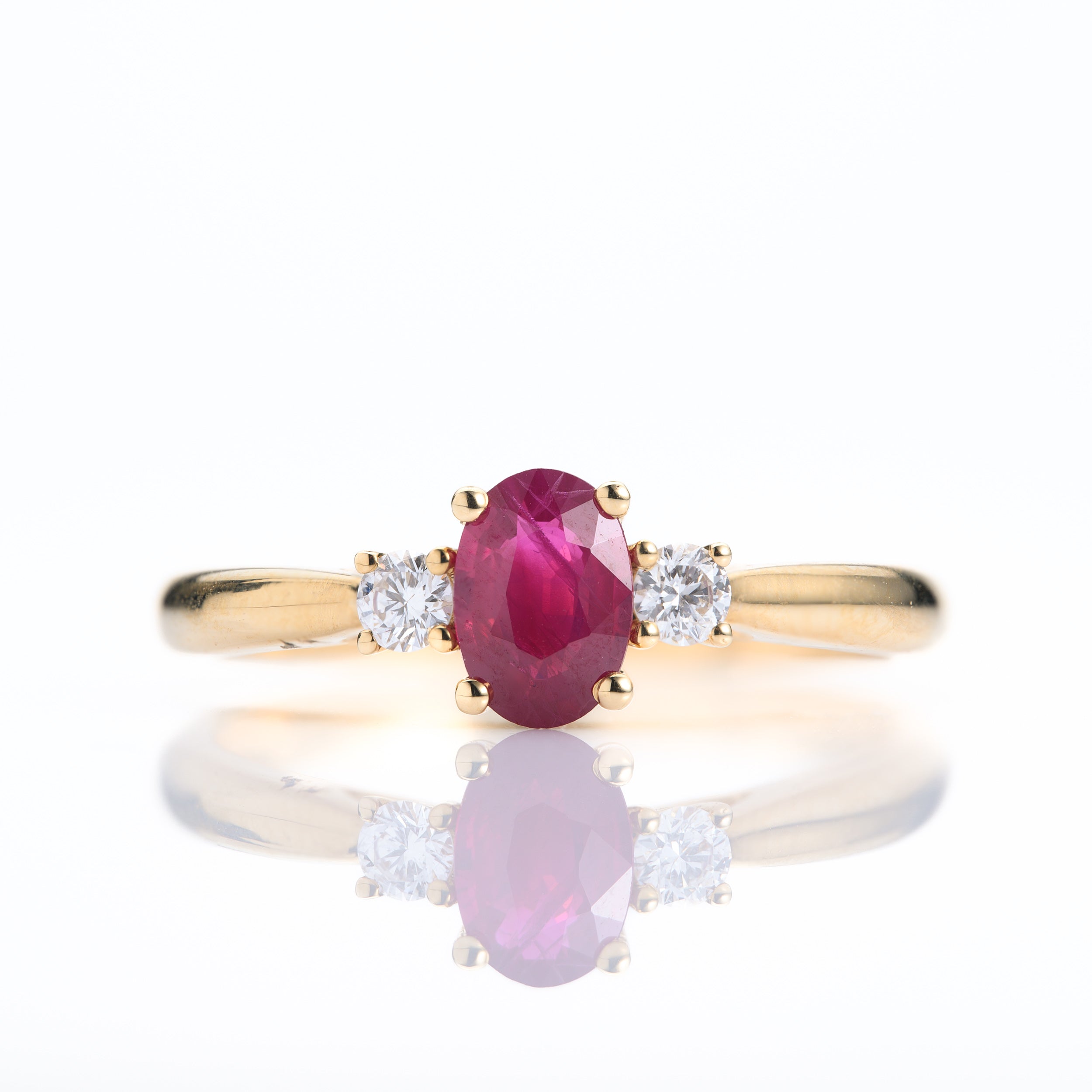 18ct Yellow Gold Oval Cut Ruby & Round Brilliant Cut Diamond Trilogy Ring