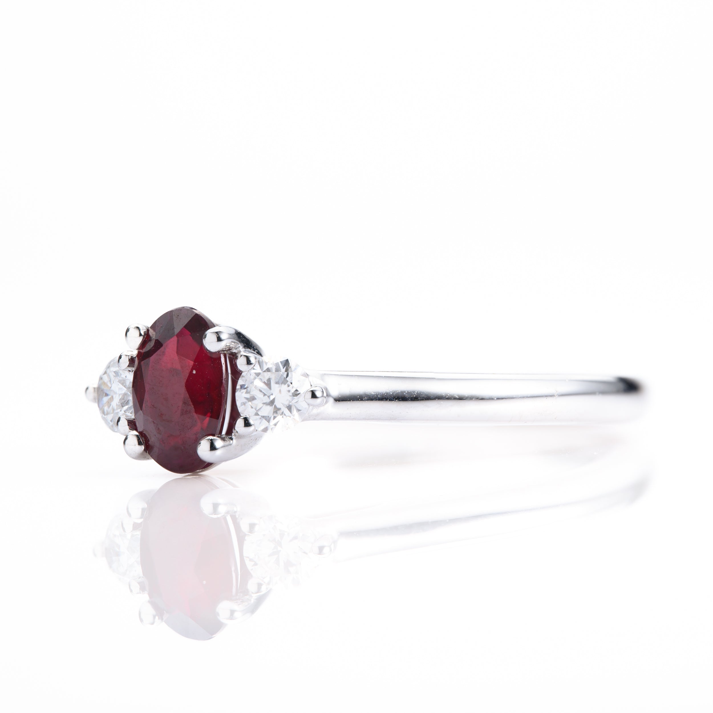 Platinum Oval Cut Ruby & Round Brilliant Cut Diamond Trilogy Ring