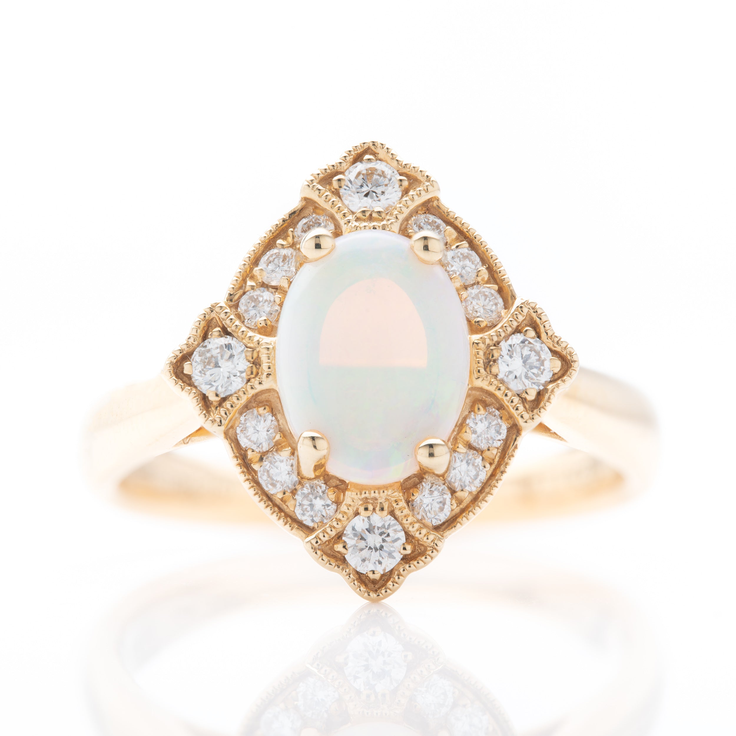 18ct Yellow Gold Oval Cut Opal and Brilliant Cut Diamond Vintage Ring with Milgrain finish