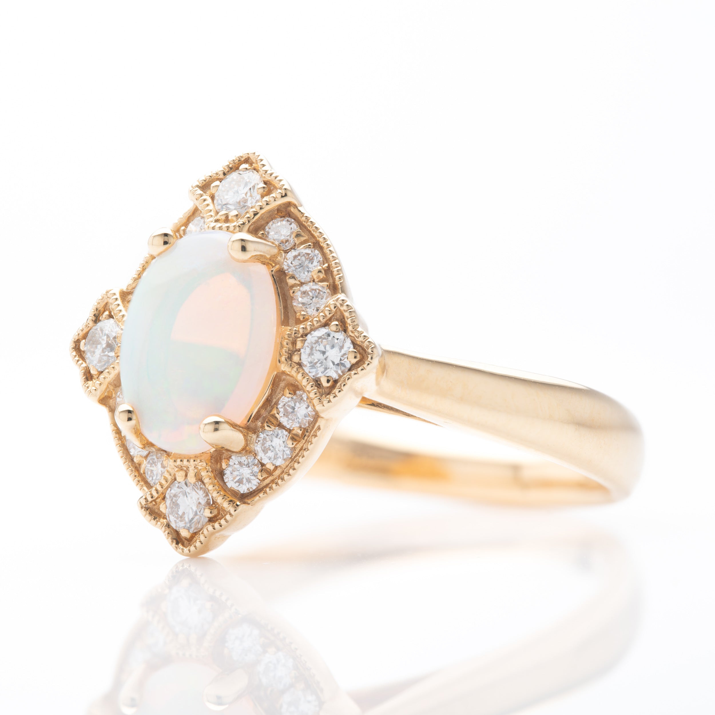 18ct Yellow Gold Oval Cut Opal and Brilliant Cut Diamond Vintage Ring with Milgrain finish