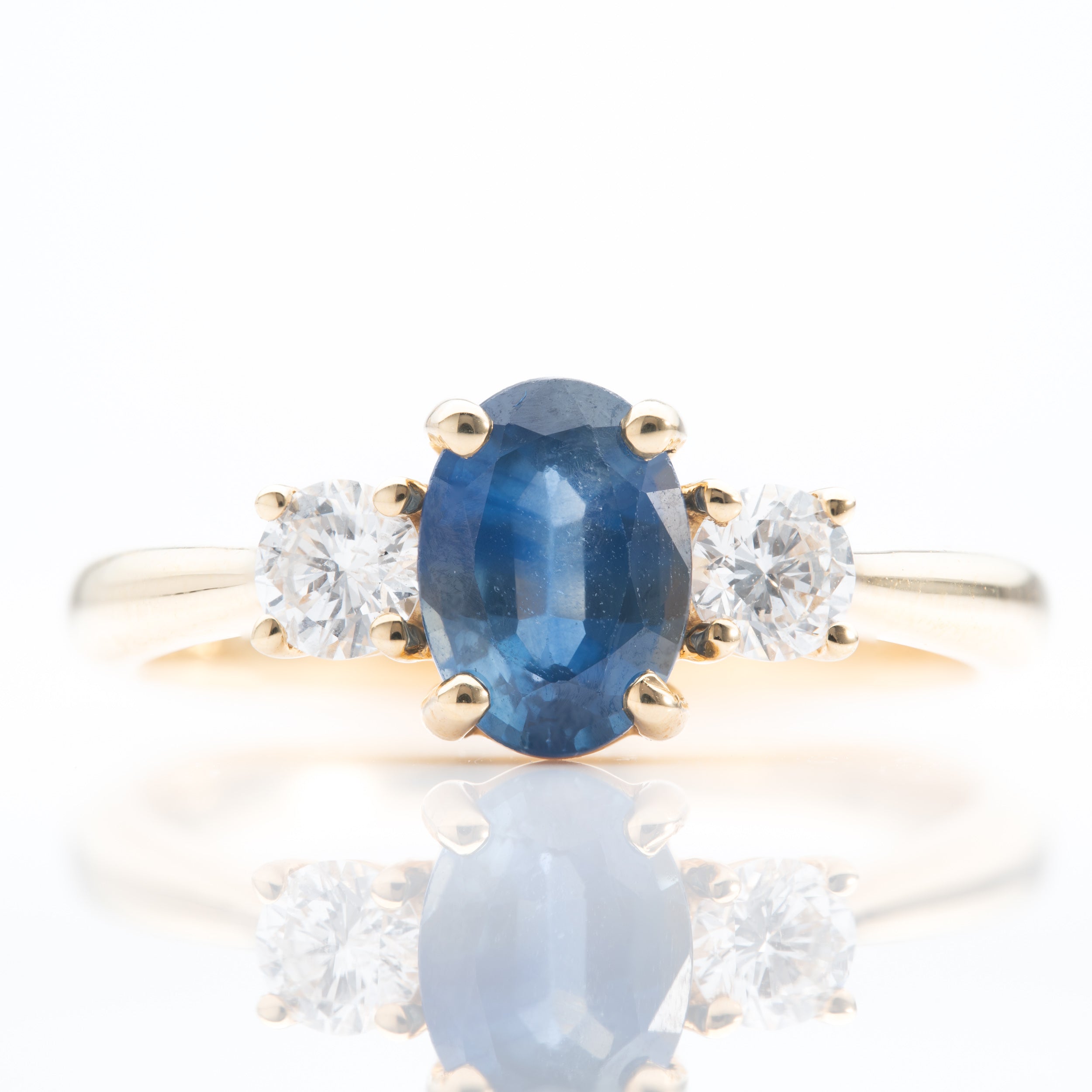 18ct Yellow Gold Oval Cut Sapphire & Brilliant Cut Diamond Trilogy Ring