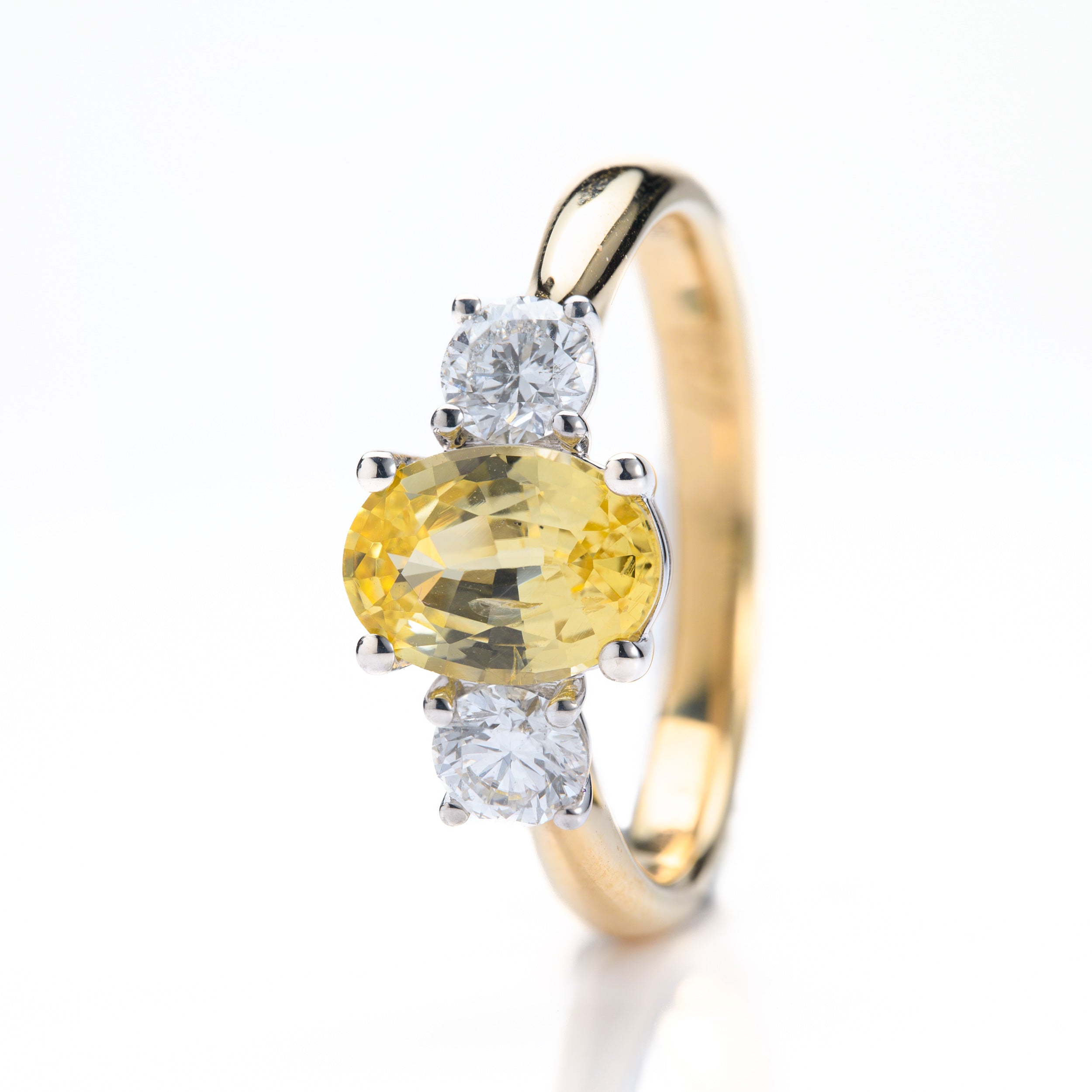 18ct Yellow Gold & Platinum Oval Cut Yellow Sapphire & Round Brilliant Cut Diamond Trilogy Ring