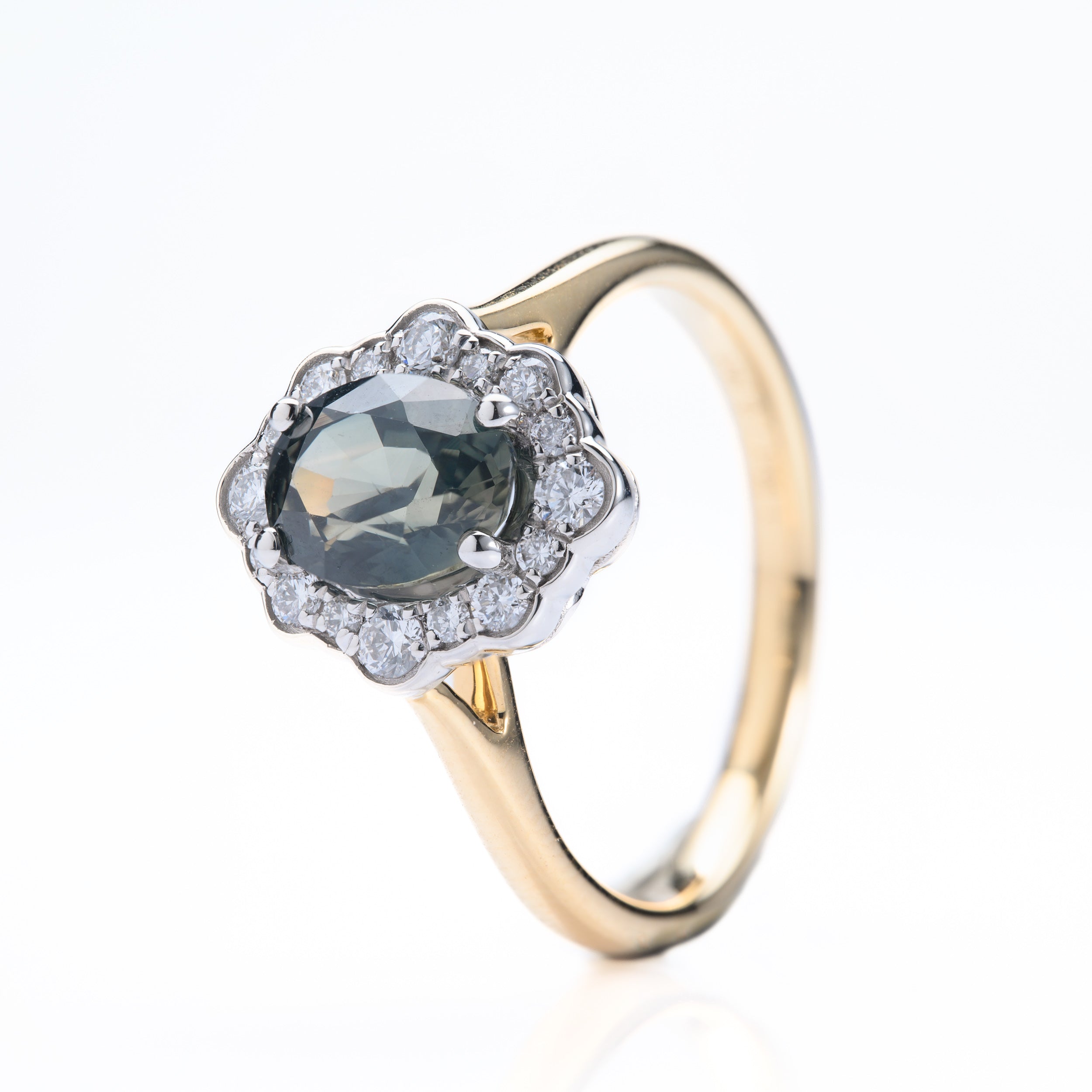 18ct Yellow Gold & Platinum Oval Cut Teal Sapphire & Round Brilliant Cut Diamond Cluster Ring