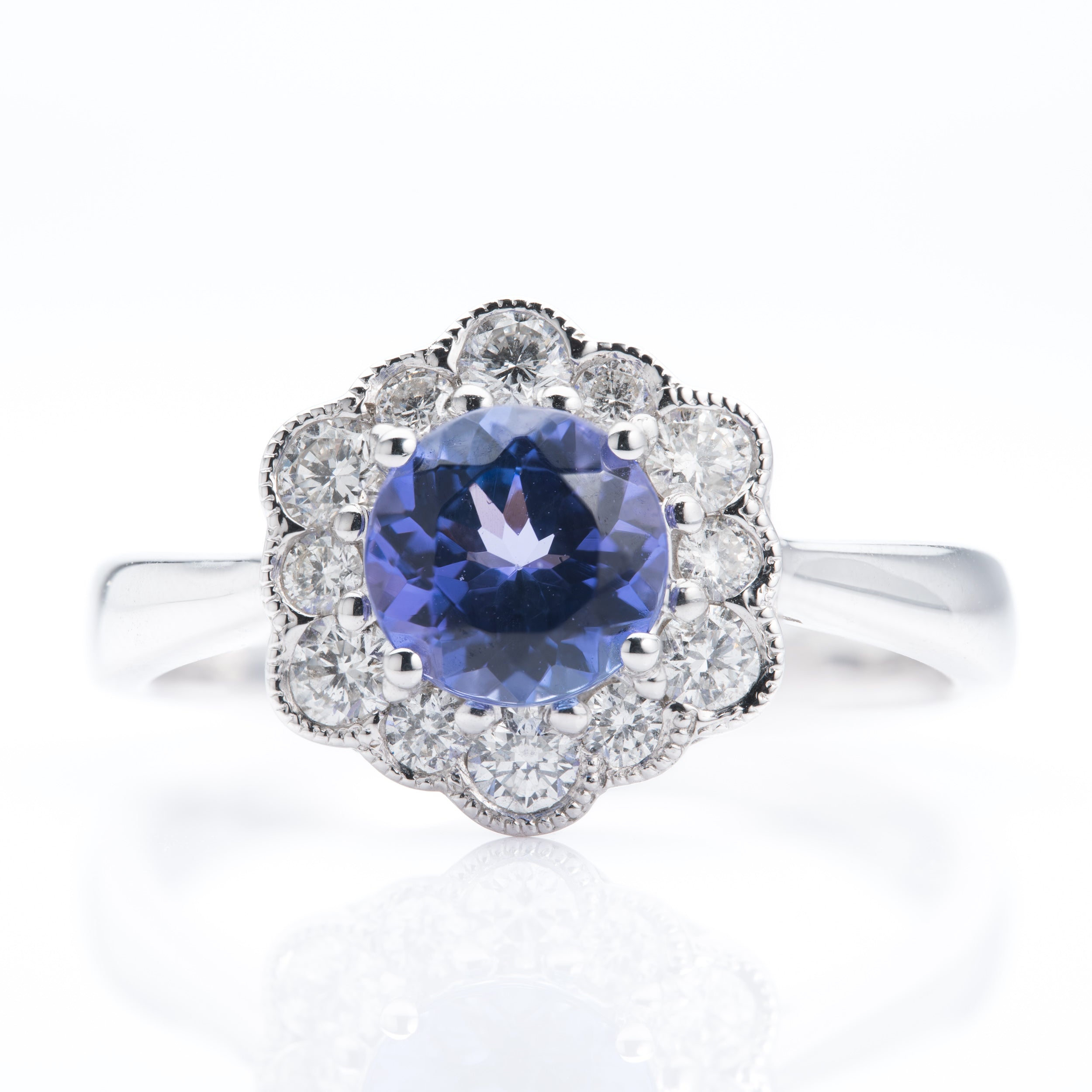 Platinum Round Cut Tanzanite & Round Brilliant Cut Diamond Cluster Ring