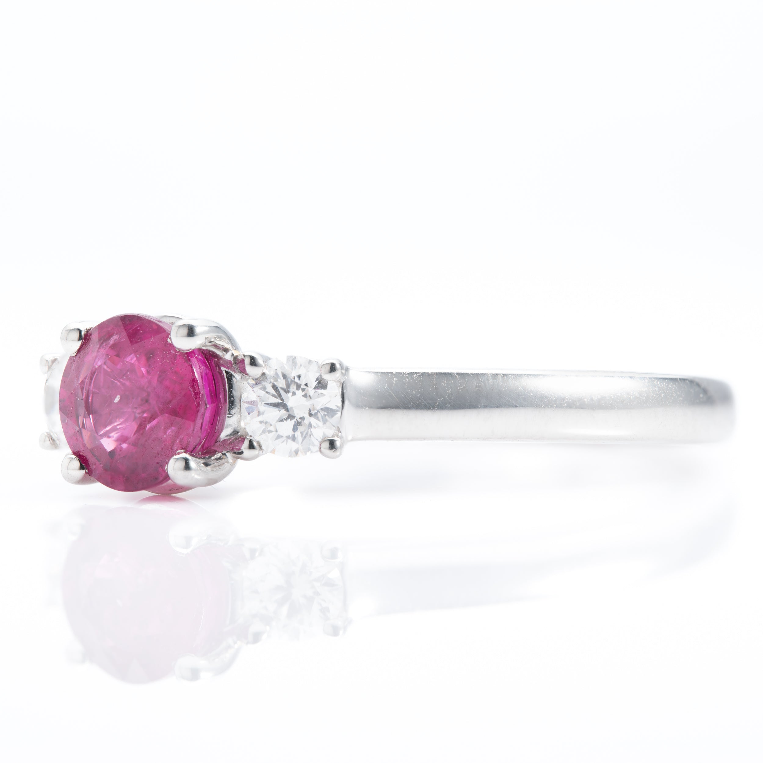 Platinum Round Cut Ruby and Brilliant Cut Diamond Trilogy Ring